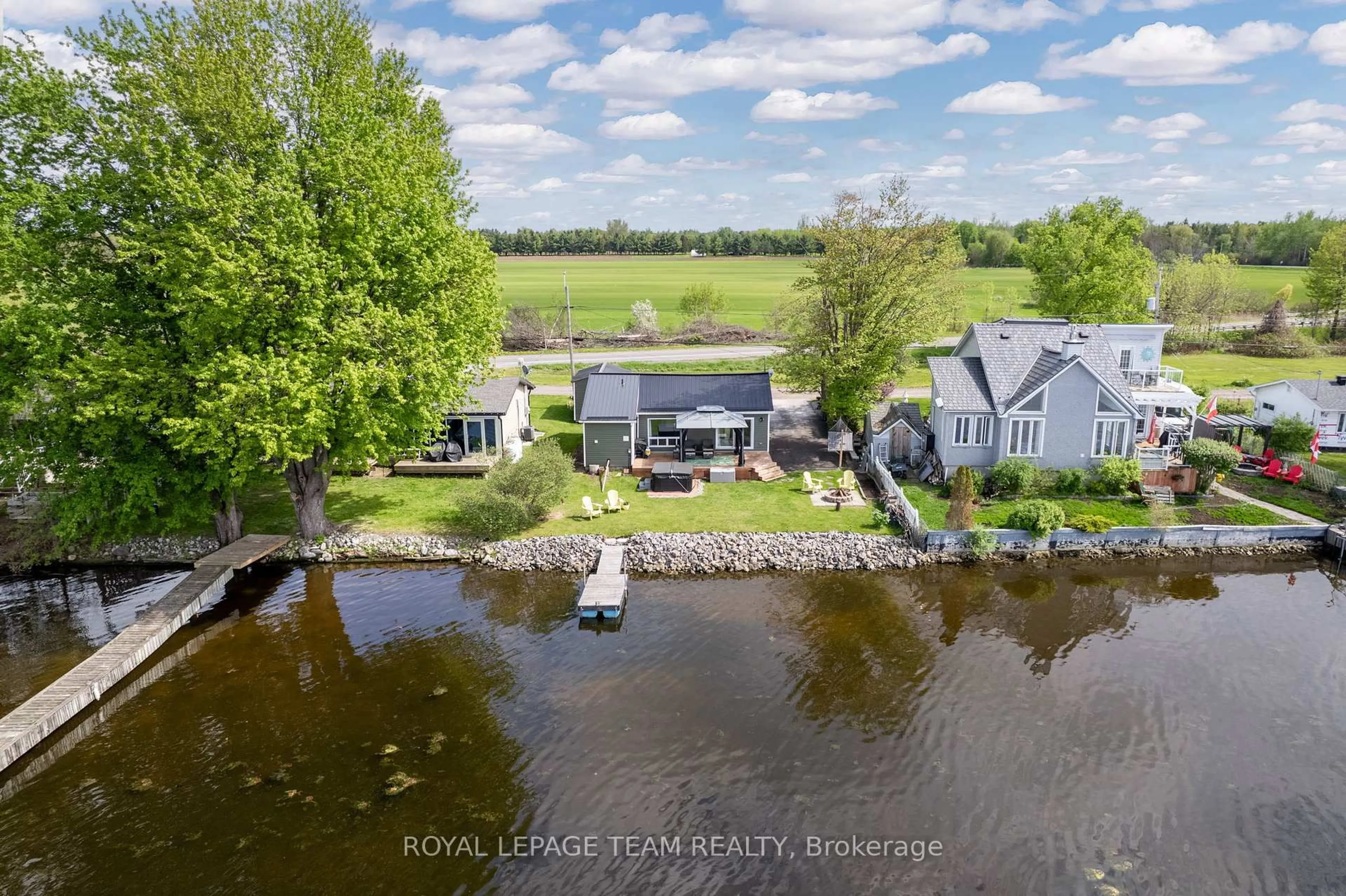 A pic from outside/outdoor area/front of a property/back of a property/a pic from drone, water/lake/river/ocean view for 3872 Lannin Lane, North Grenville Ontario K0G 1J0