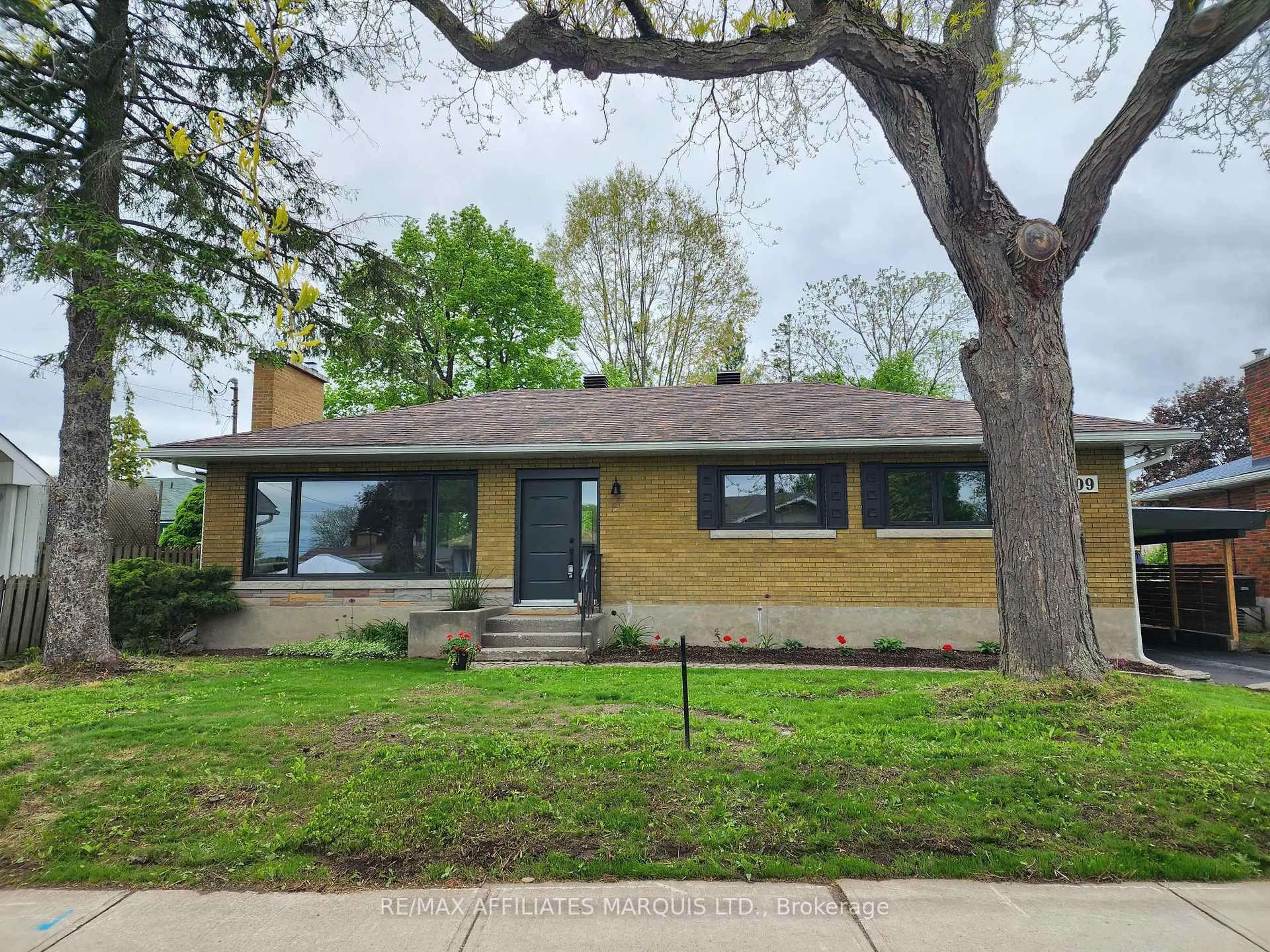 Home with brick exterior material, street for 1409 Leonard Ave, Cornwall Ontario K6J 1M9