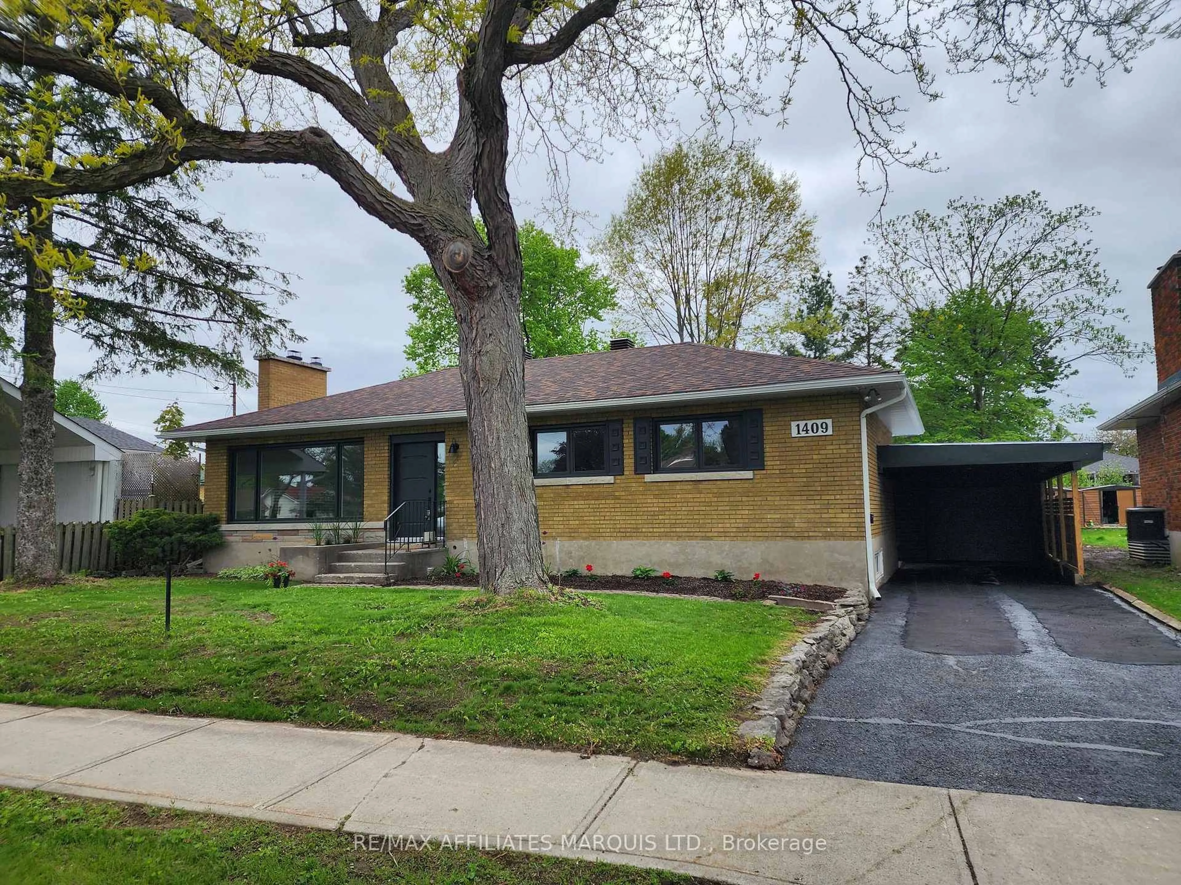 Home with brick exterior material, street for 1409 Leonard Ave, Cornwall Ontario K6J 1M9