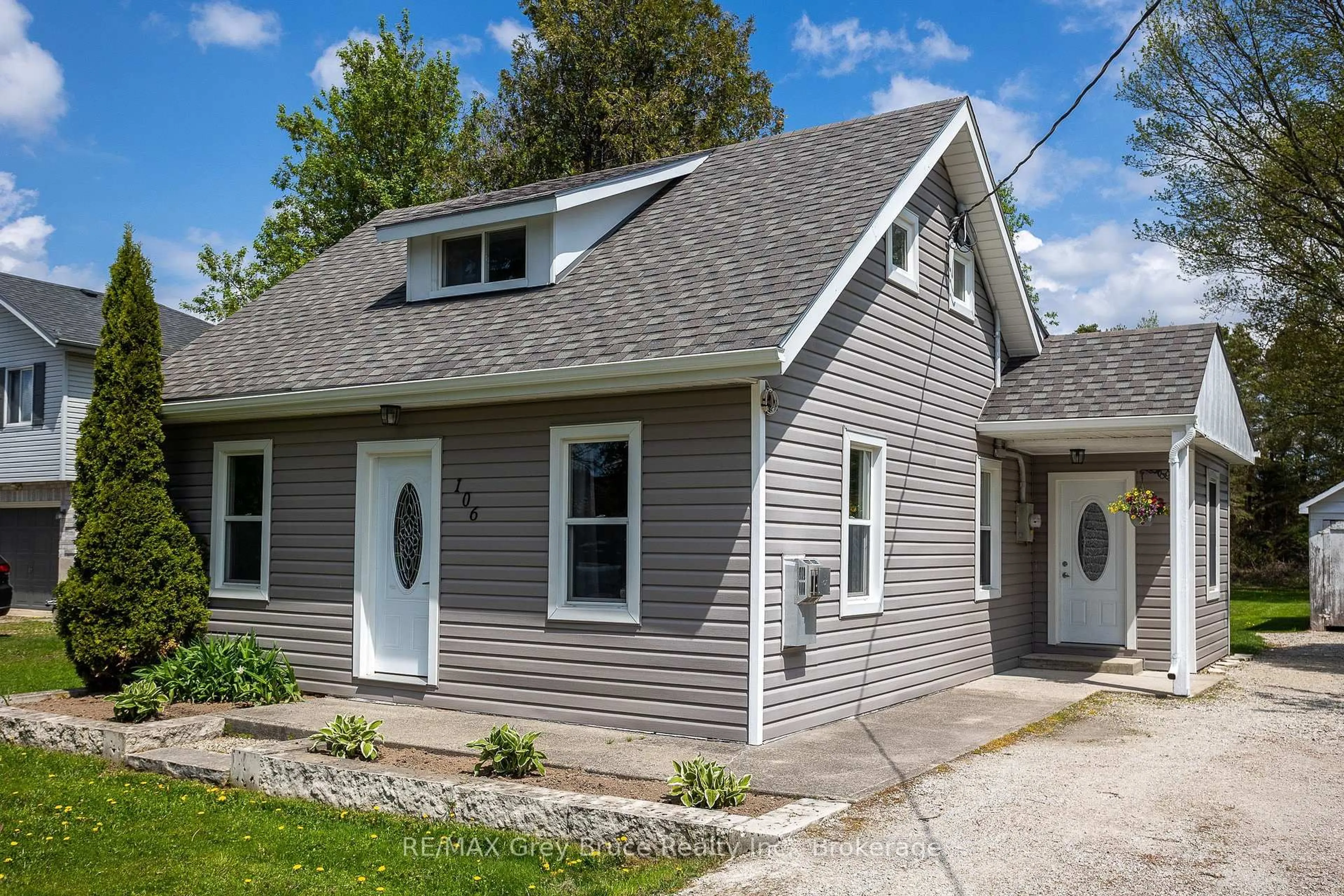 Home with vinyl exterior material, street for 106 Spencer St, South Bruce Peninsula Ontario N0H 1P0