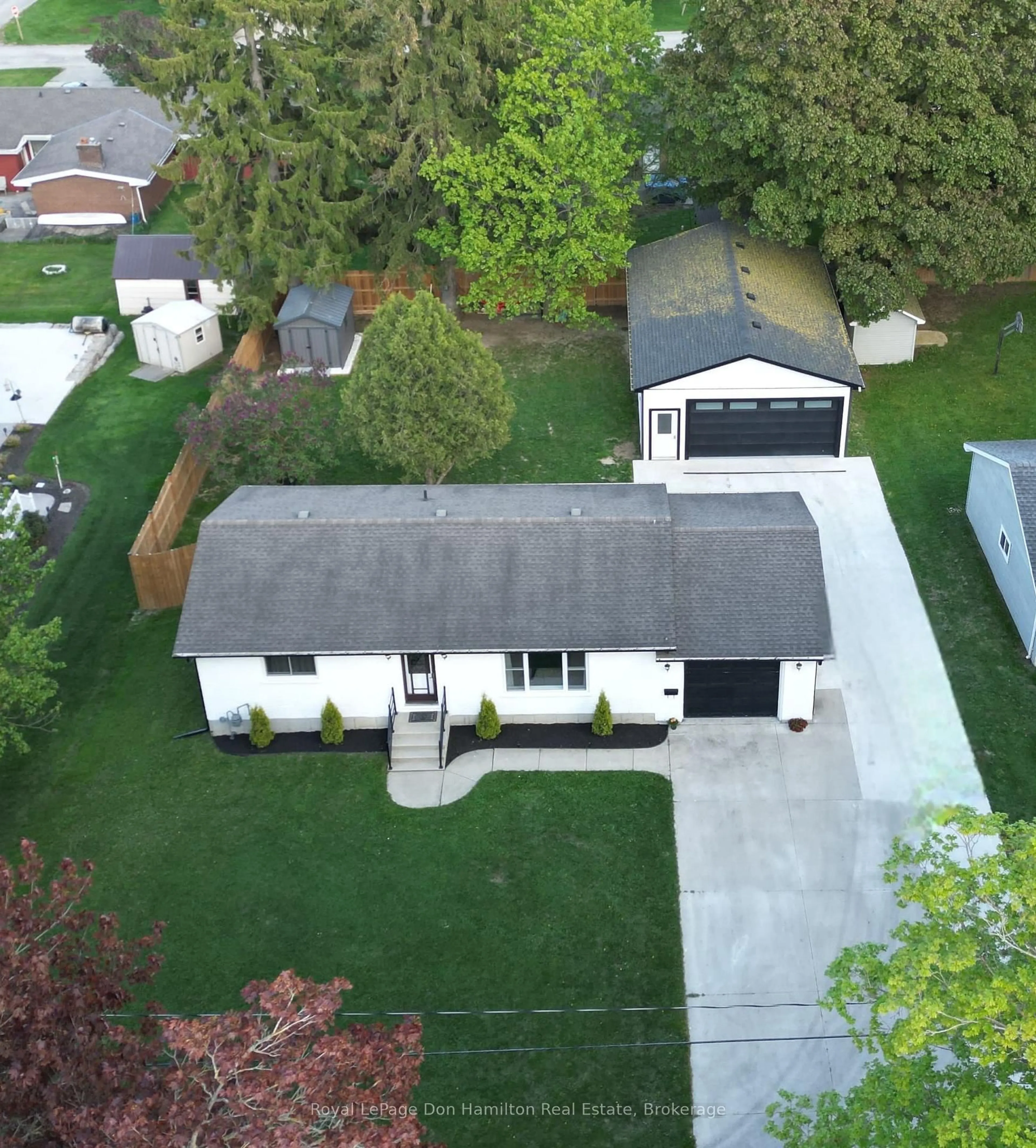 A pic from outside/outdoor area/front of a property/back of a property/a pic from drone, street for 717 Ainley St, Huron East Ontario N0G 1H0