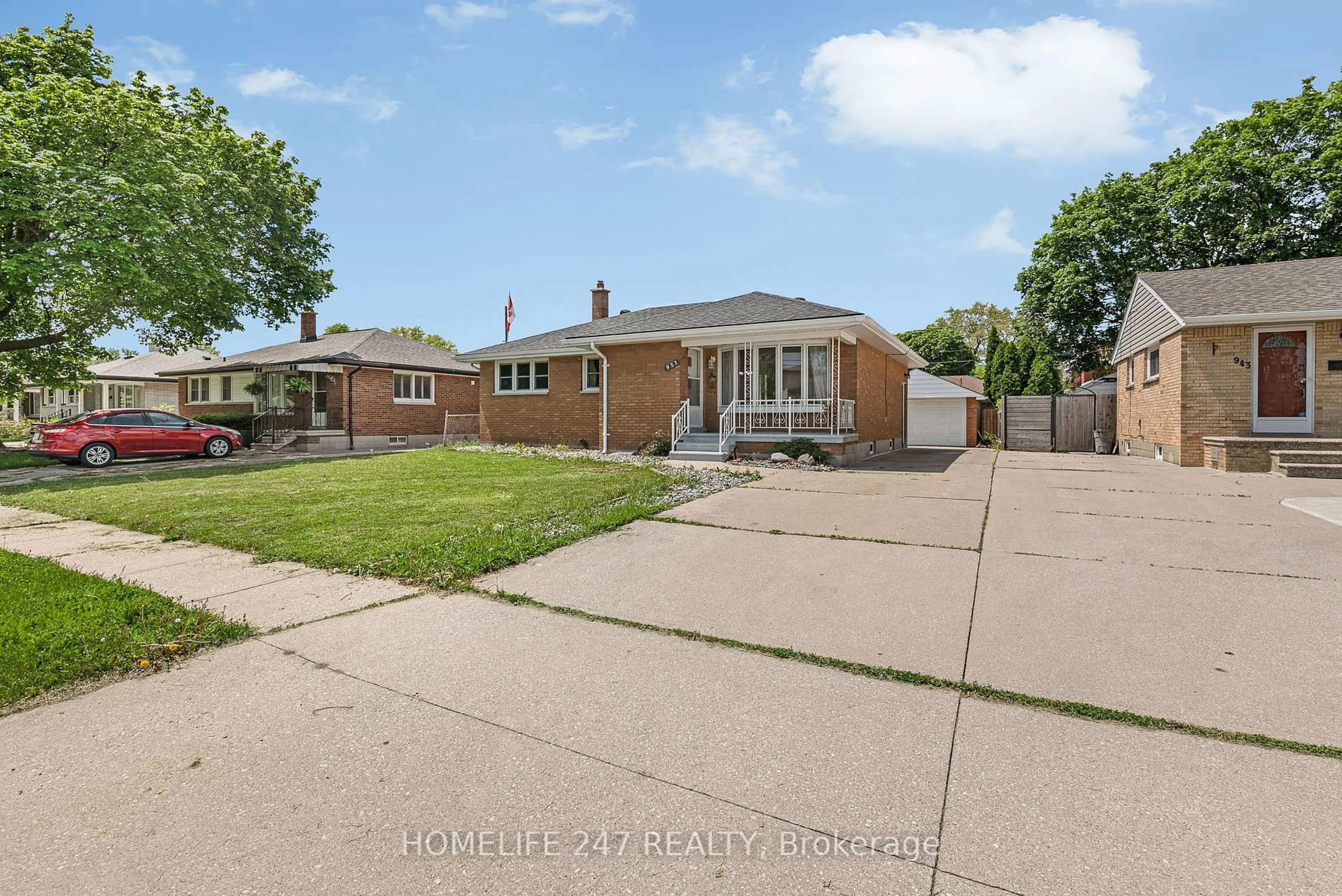 Home with brick exterior material, street for 951 Riverdale Ave, Windsor Ontario N8S 4C4