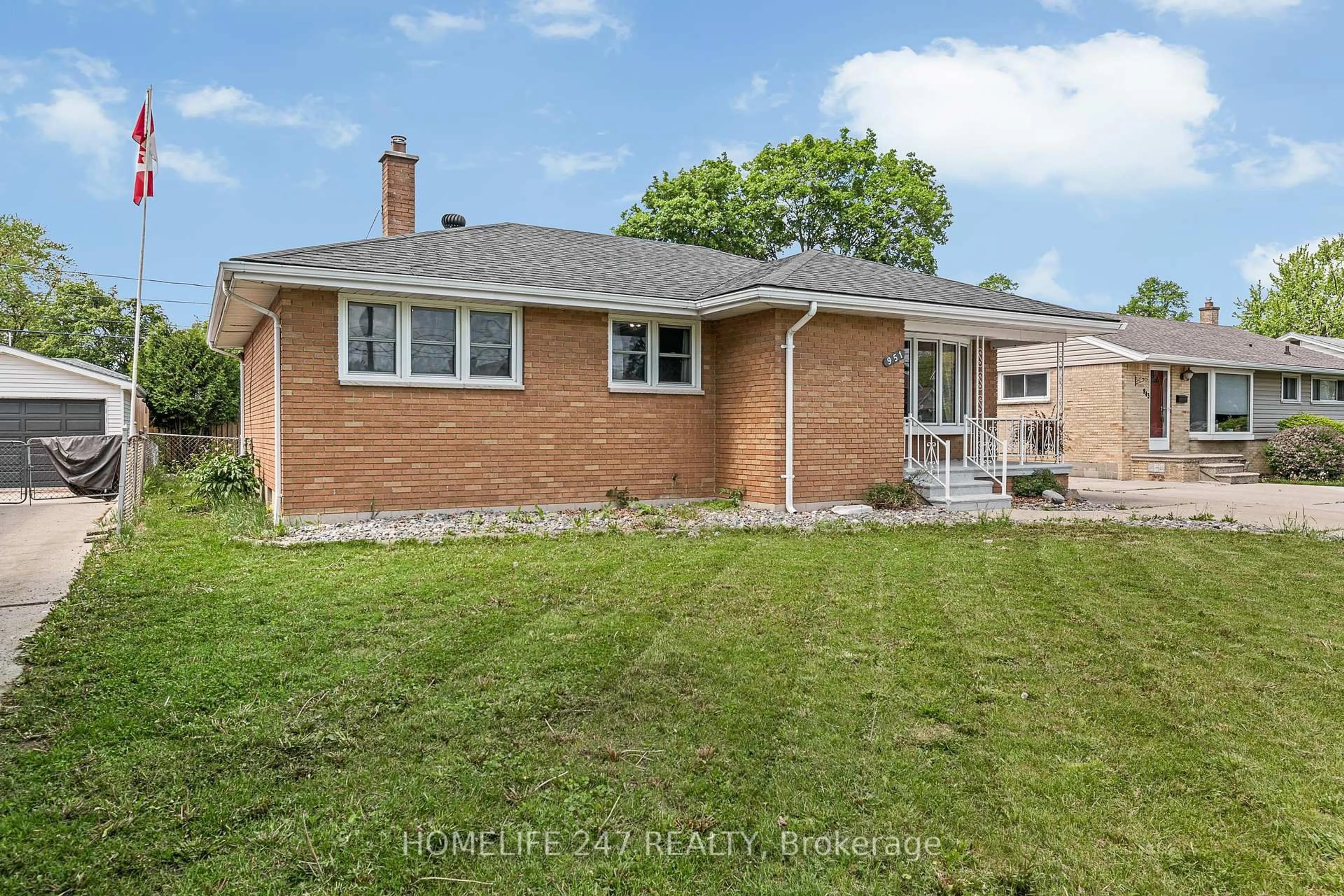 A pic from outside/outdoor area/front of a property/back of a property/a pic from drone, street for 951 Riverdale Ave, Windsor Ontario N8S 4C4