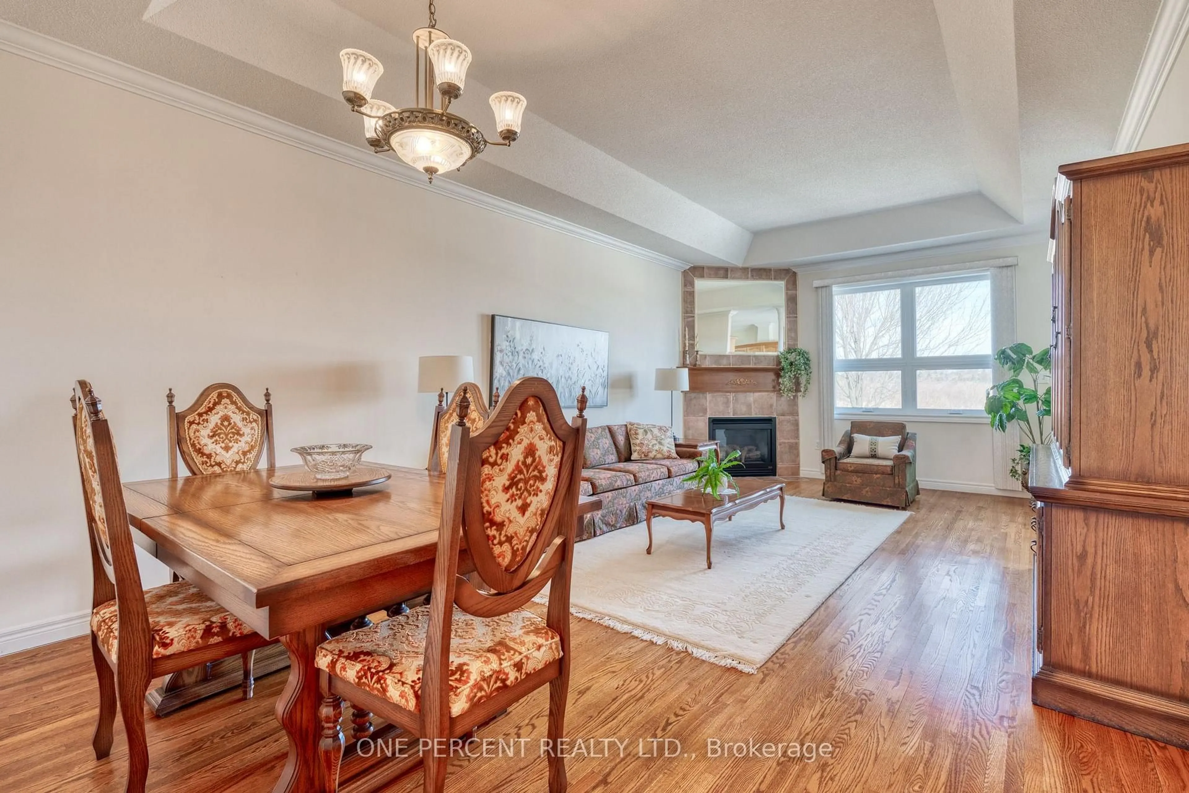 Living room with furniture, wood/laminate floor for 68 NORTHERNBREEZE St, Hamilton Ontario L0R 1W0