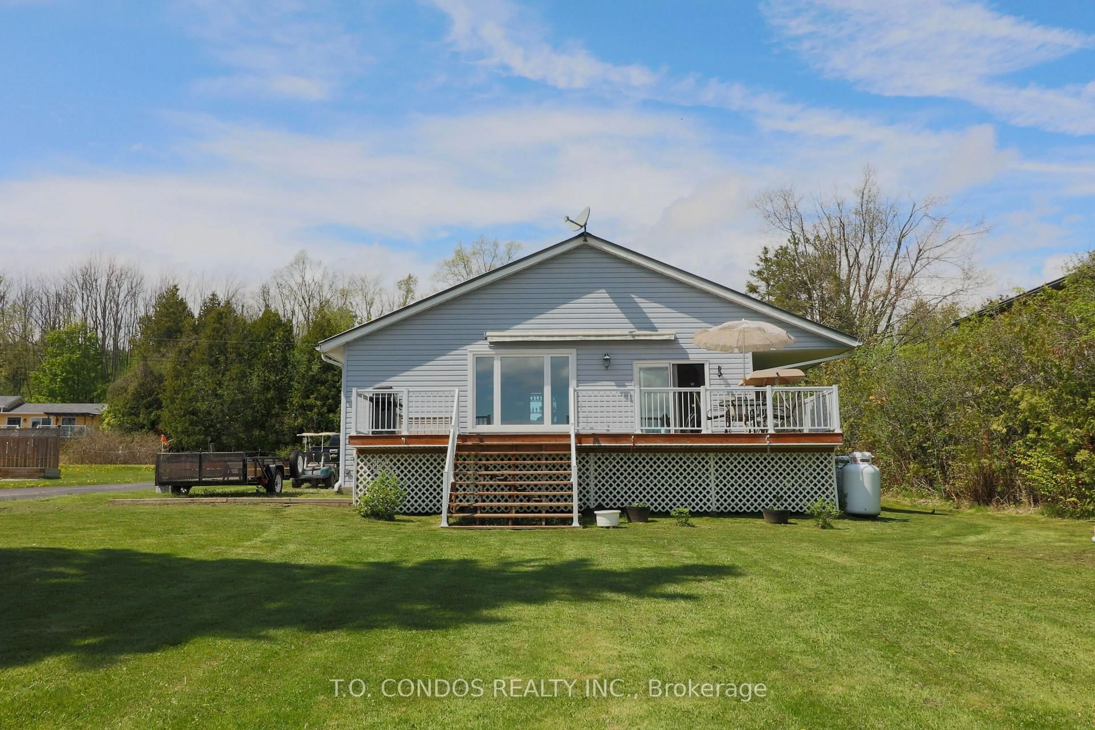 A pic from outside/outdoor area/front of a property/back of a property/a pic from drone, water/lake/river/ocean view for 689 North Shore Dr, Otonabee-South Monaghan Ontario K0L 1B0