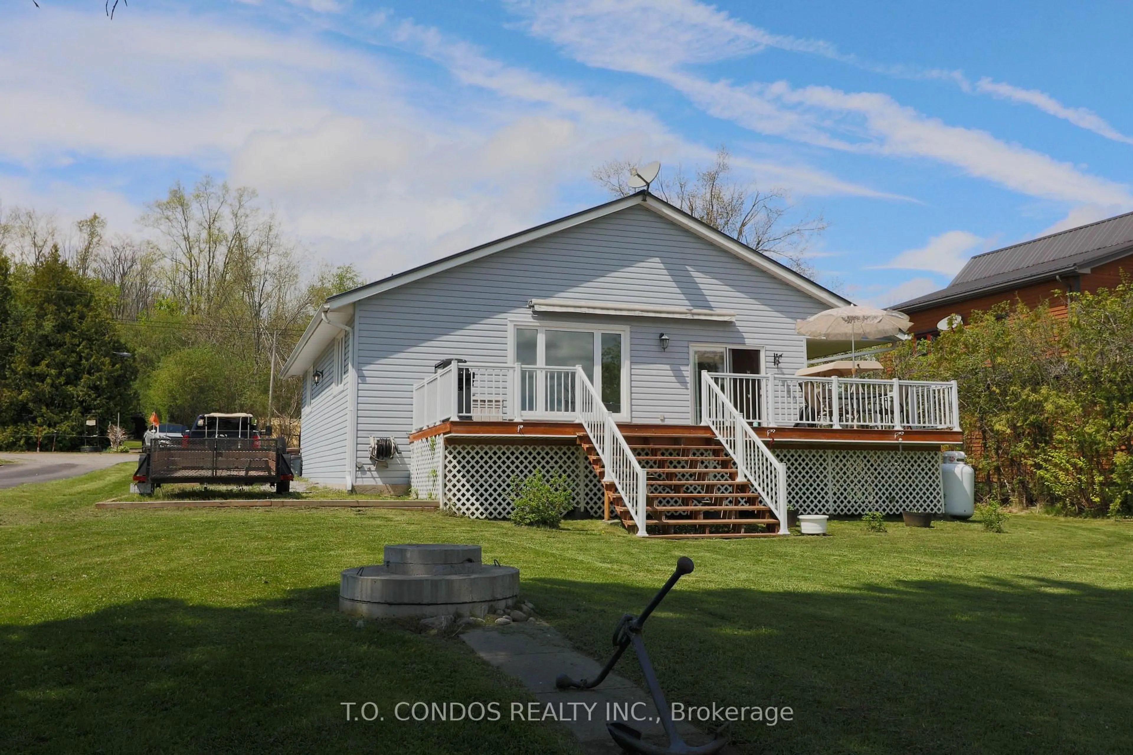 A pic from outside/outdoor area/front of a property/back of a property/a pic from drone, water/lake/river/ocean view for 689 North Shore Dr, Otonabee-South Monaghan Ontario K0L 1B0