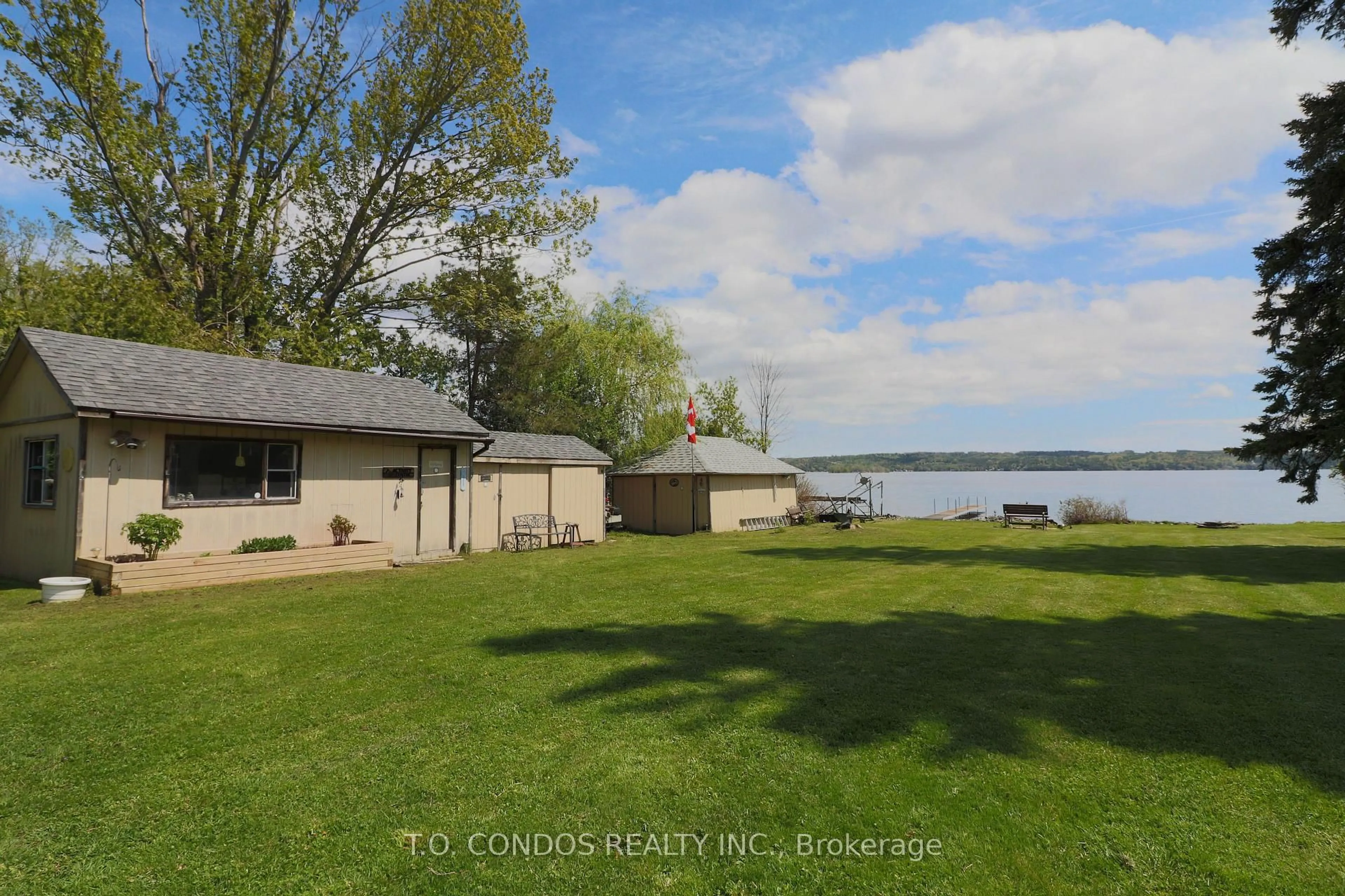 A pic from outside/outdoor area/front of a property/back of a property/a pic from drone, water/lake/river/ocean view for 689 North Shore Dr, Otonabee-South Monaghan Ontario K0L 1B0
