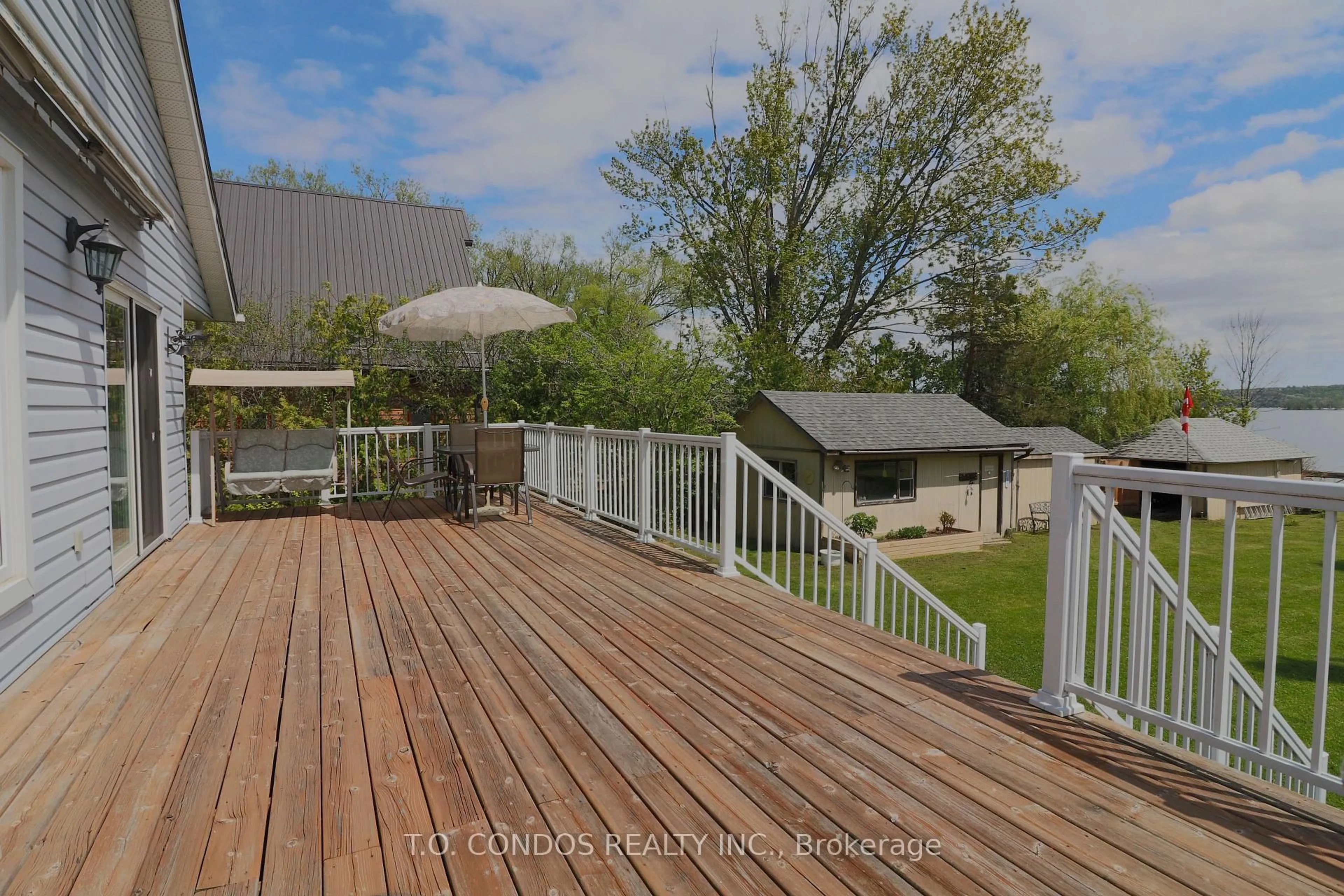 A pic from outside/outdoor area/front of a property/back of a property/a pic from drone, water/lake/river/ocean view for 689 North Shore Dr, Otonabee-South Monaghan Ontario K0L 1B0