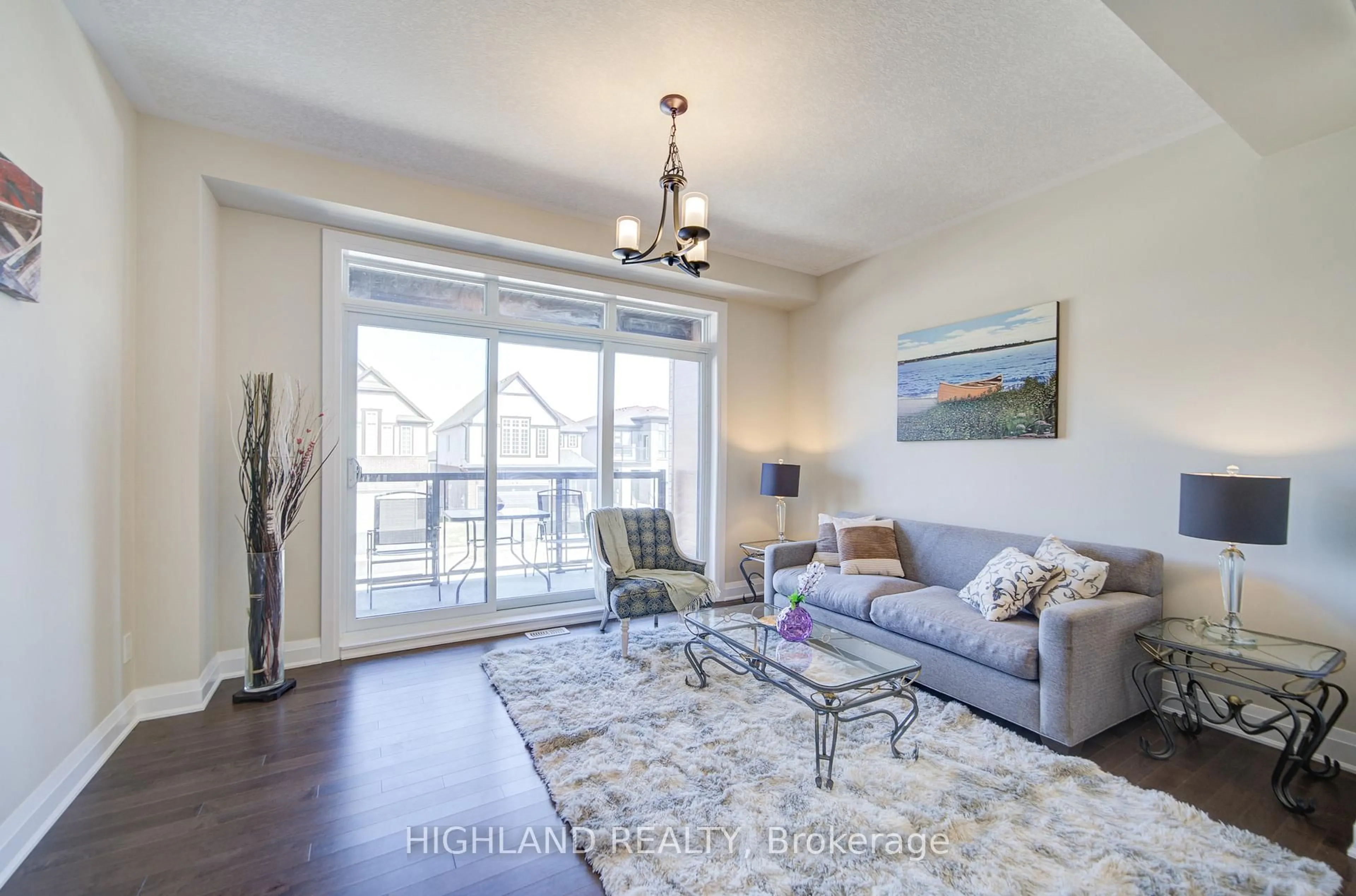 Living room with furniture, wood/laminate floor for 565 Balsam Poplar St, Waterloo Ontario N2V 0H8
