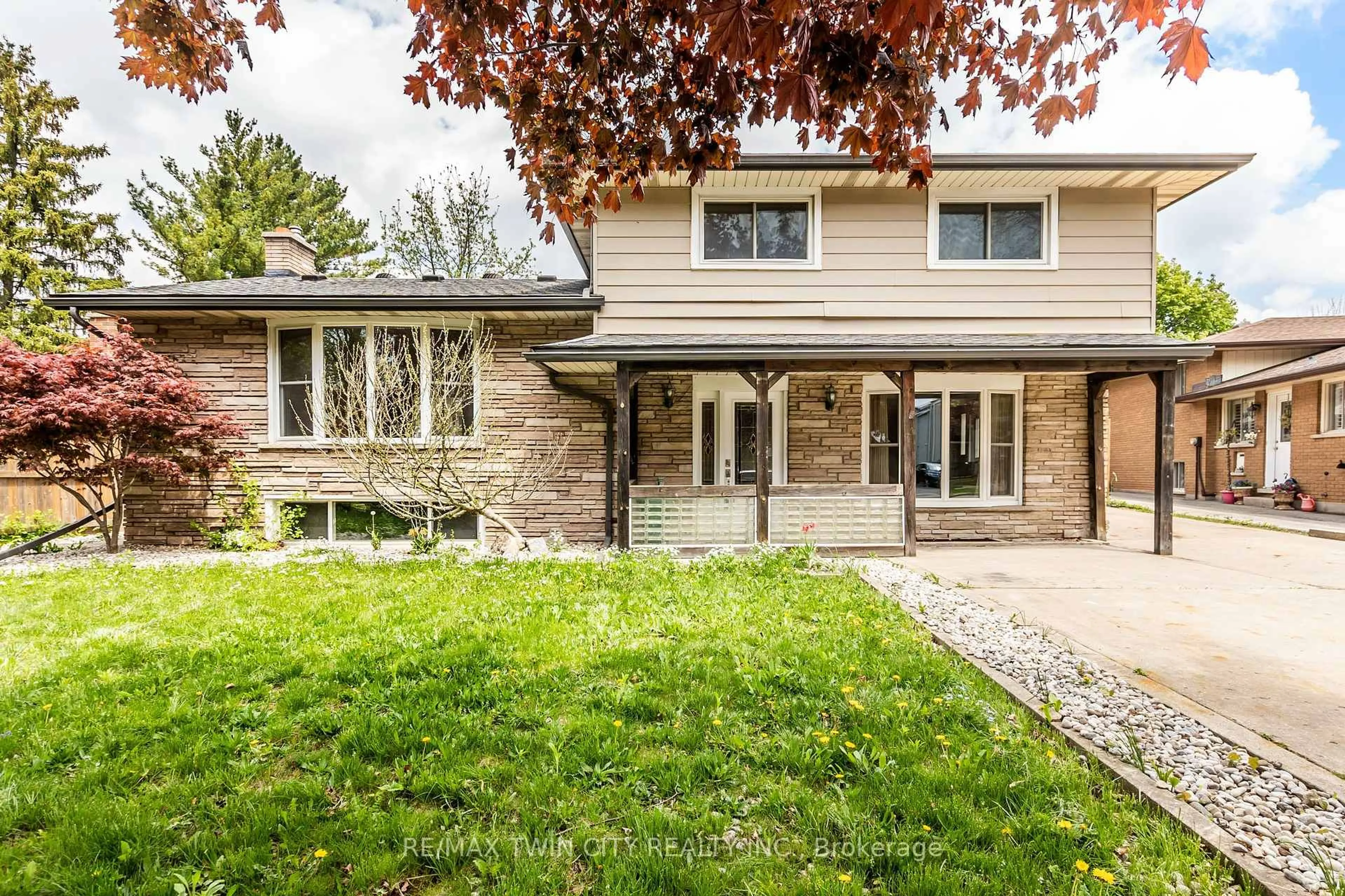 Home with brick exterior material, street for 413 Carson Dr, Kitchener Ontario N2B 2W5