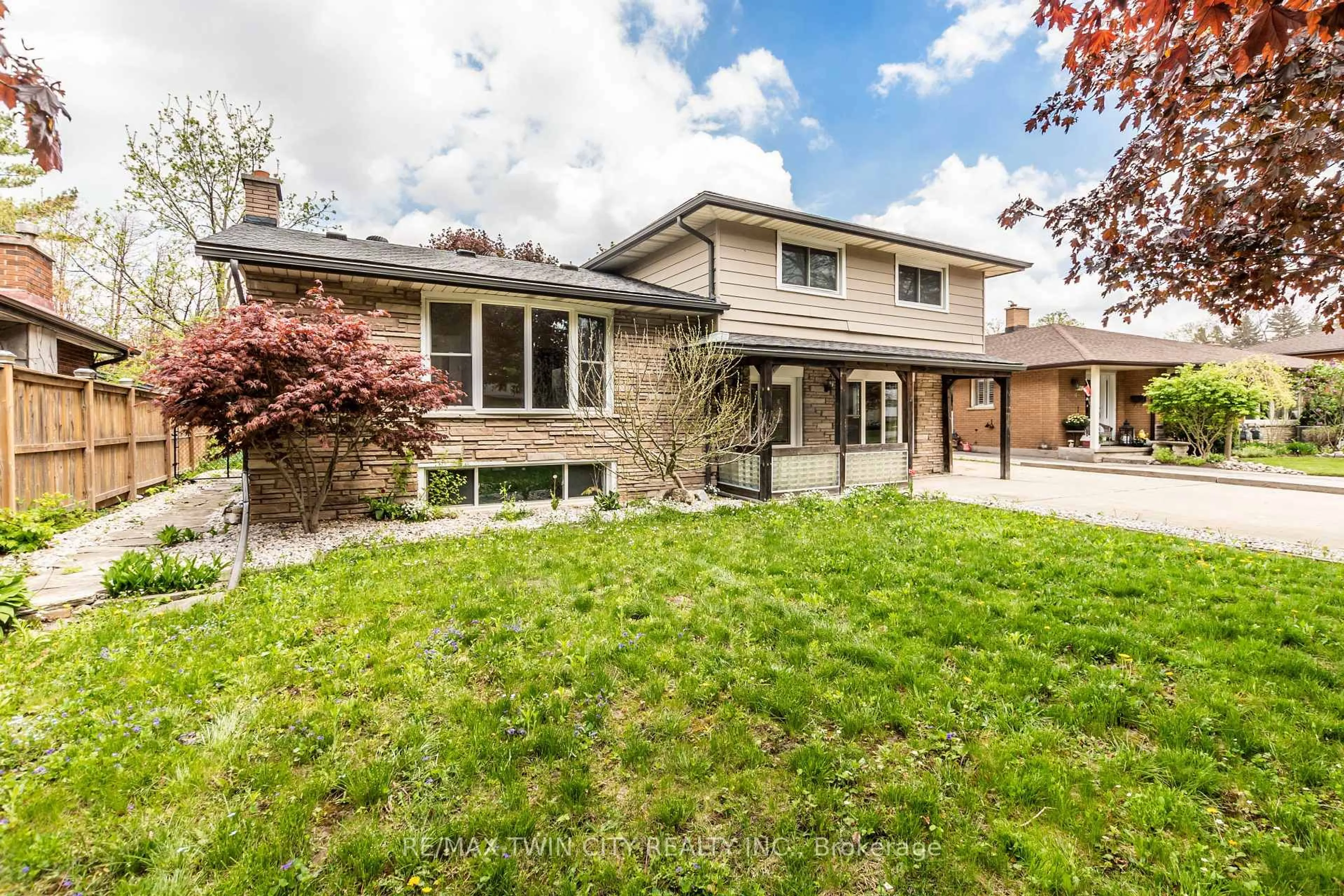 Home with brick exterior material, street for 413 Carson Dr, Kitchener Ontario N2B 2W5
