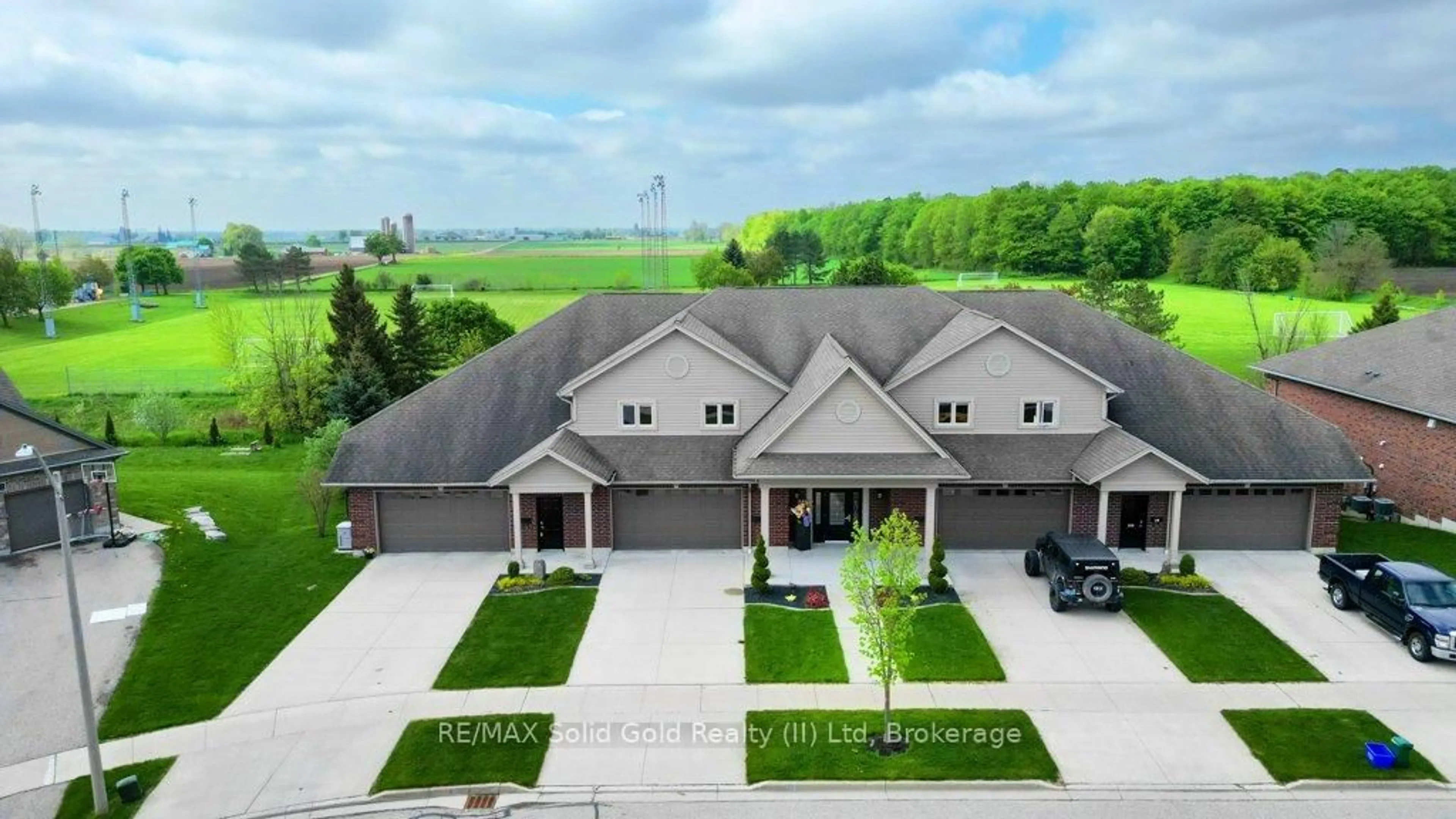A pic from outside/outdoor area/front of a property/back of a property/a pic from drone, unknown for 51 Snow Goose Cres, Woolwich Ontario N3B 3M4