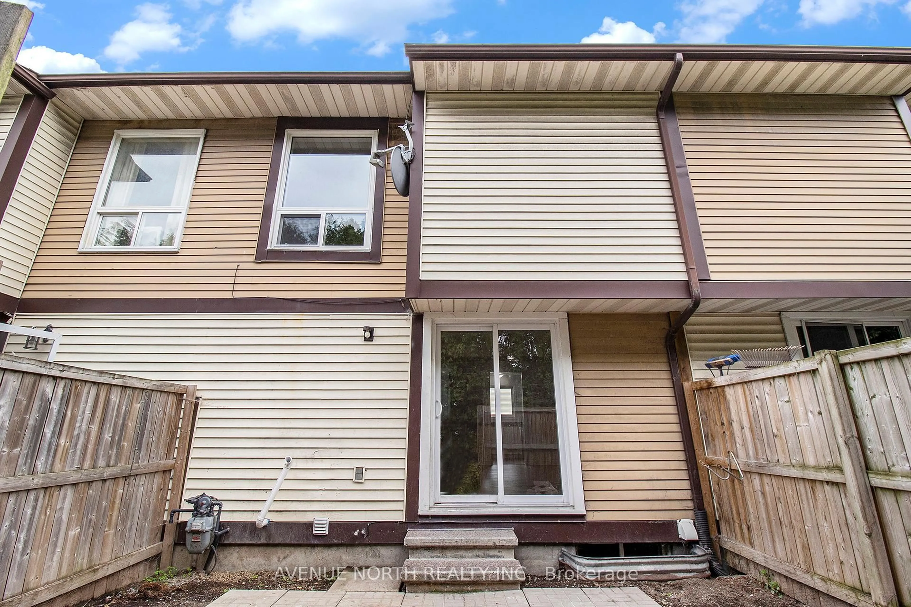 Home with vinyl exterior material, street for 1372 Foxwell St, Ottawa Ontario K1B 5J2
