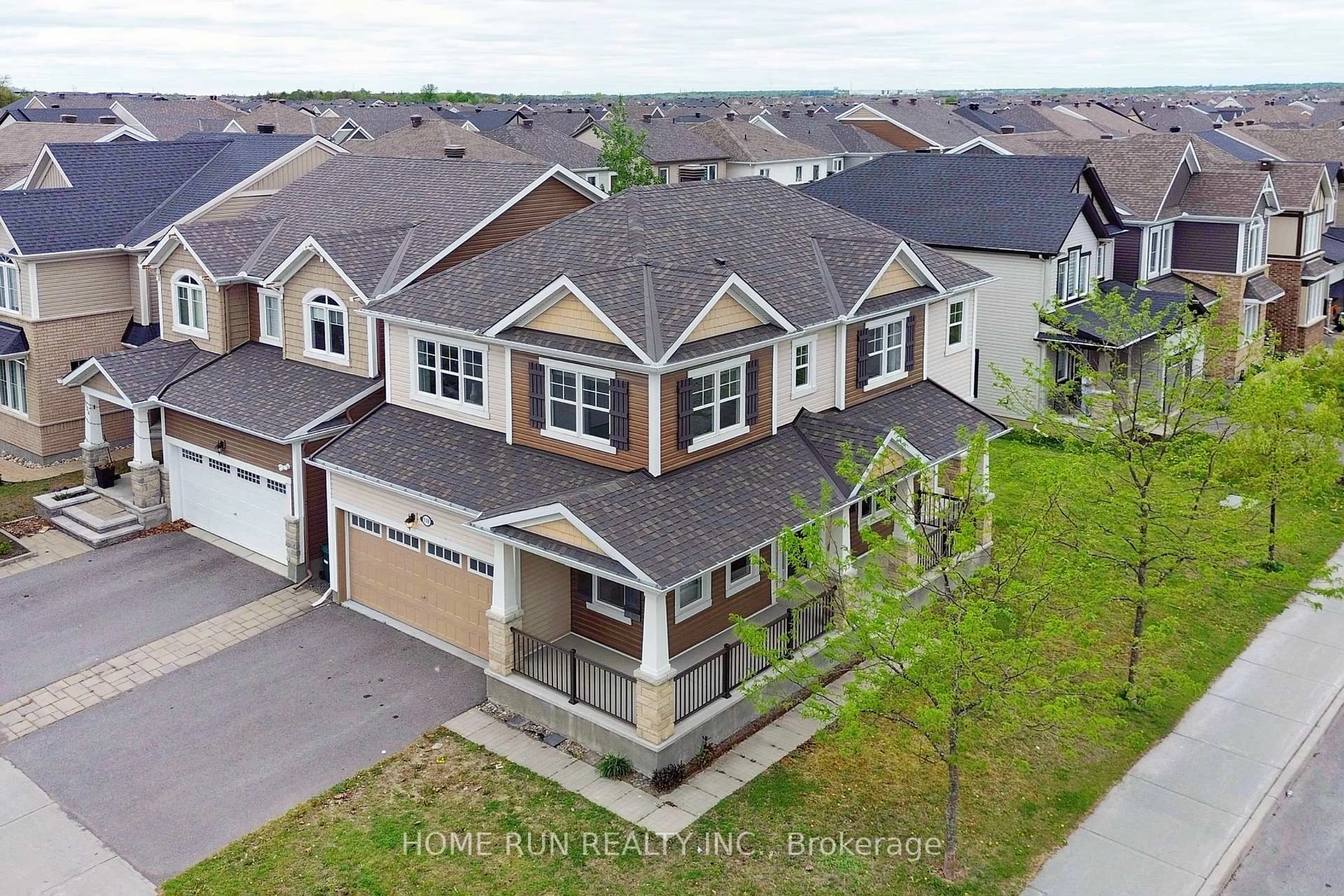 A pic from outside/outdoor area/front of a property/back of a property/a pic from drone, street for 118 DAMSELFLY Way, Ottawa Ontario K2J 6C4