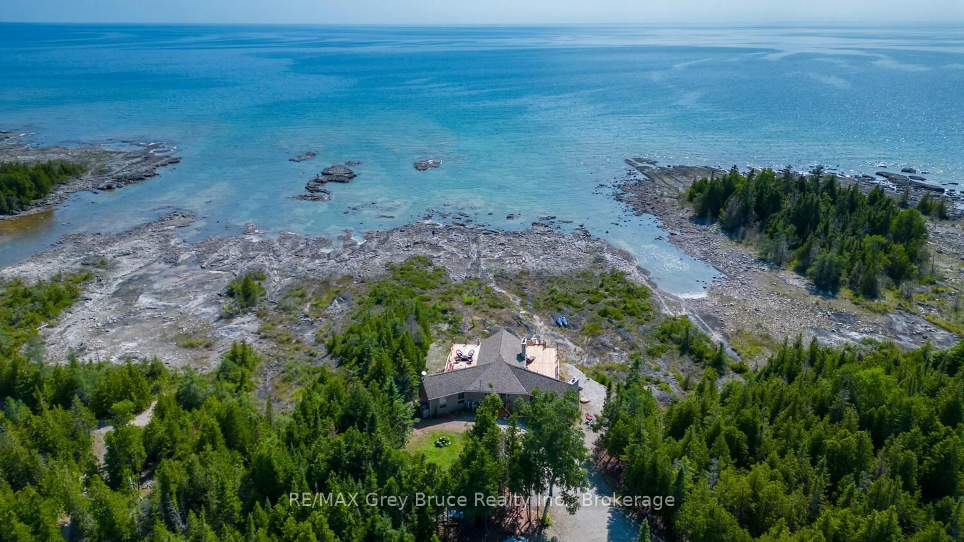 A pic from outside/outdoor area/front of a property/back of a property/a pic from drone, water/lake/river/ocean view for 157 Zorra Dr, Northern Bruce Peninsula Ontario N0H 2R0
