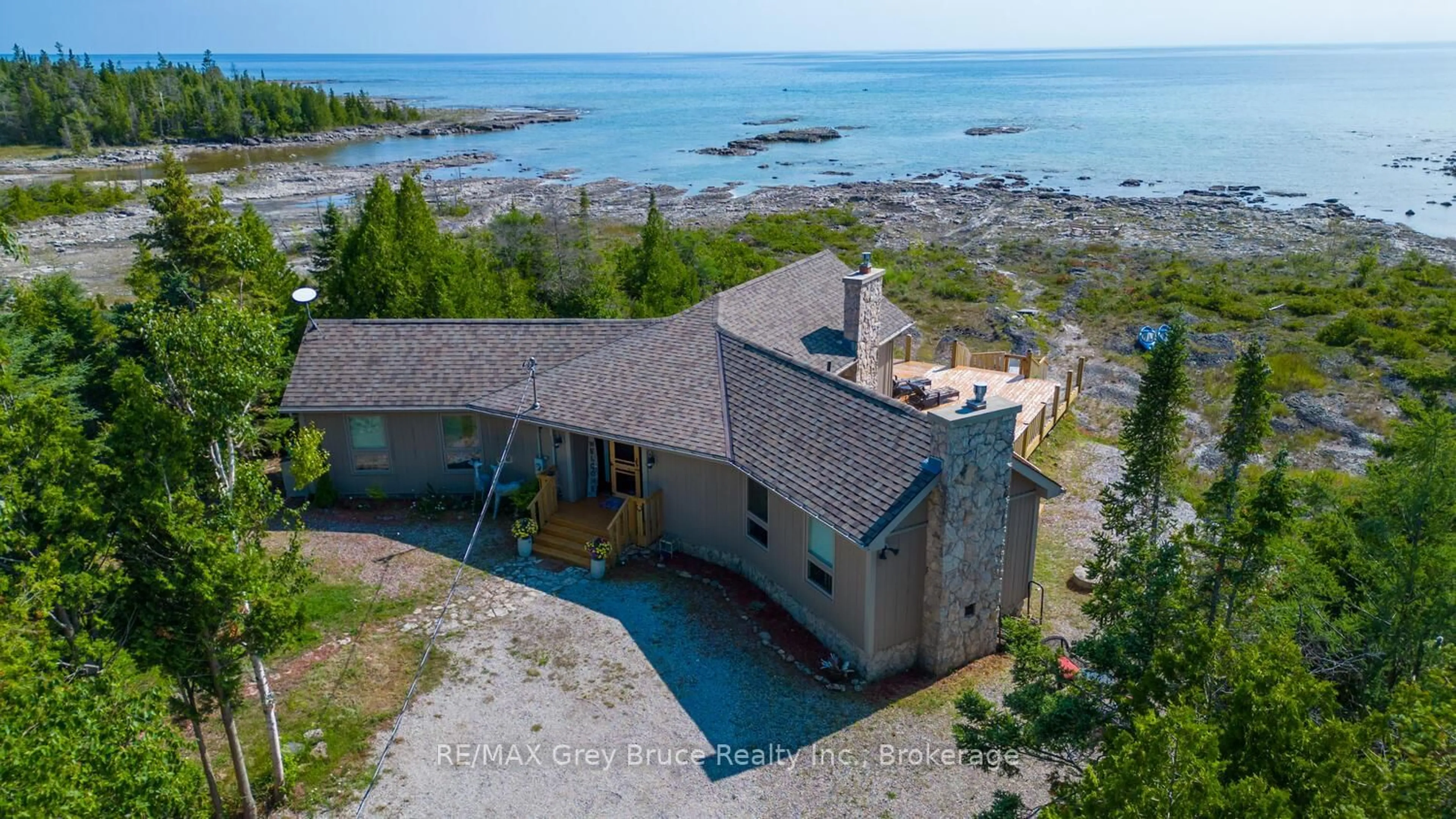 A pic from outside/outdoor area/front of a property/back of a property/a pic from drone, water/lake/river/ocean view for 157 Zorra Dr, Northern Bruce Peninsula Ontario N0H 2R0