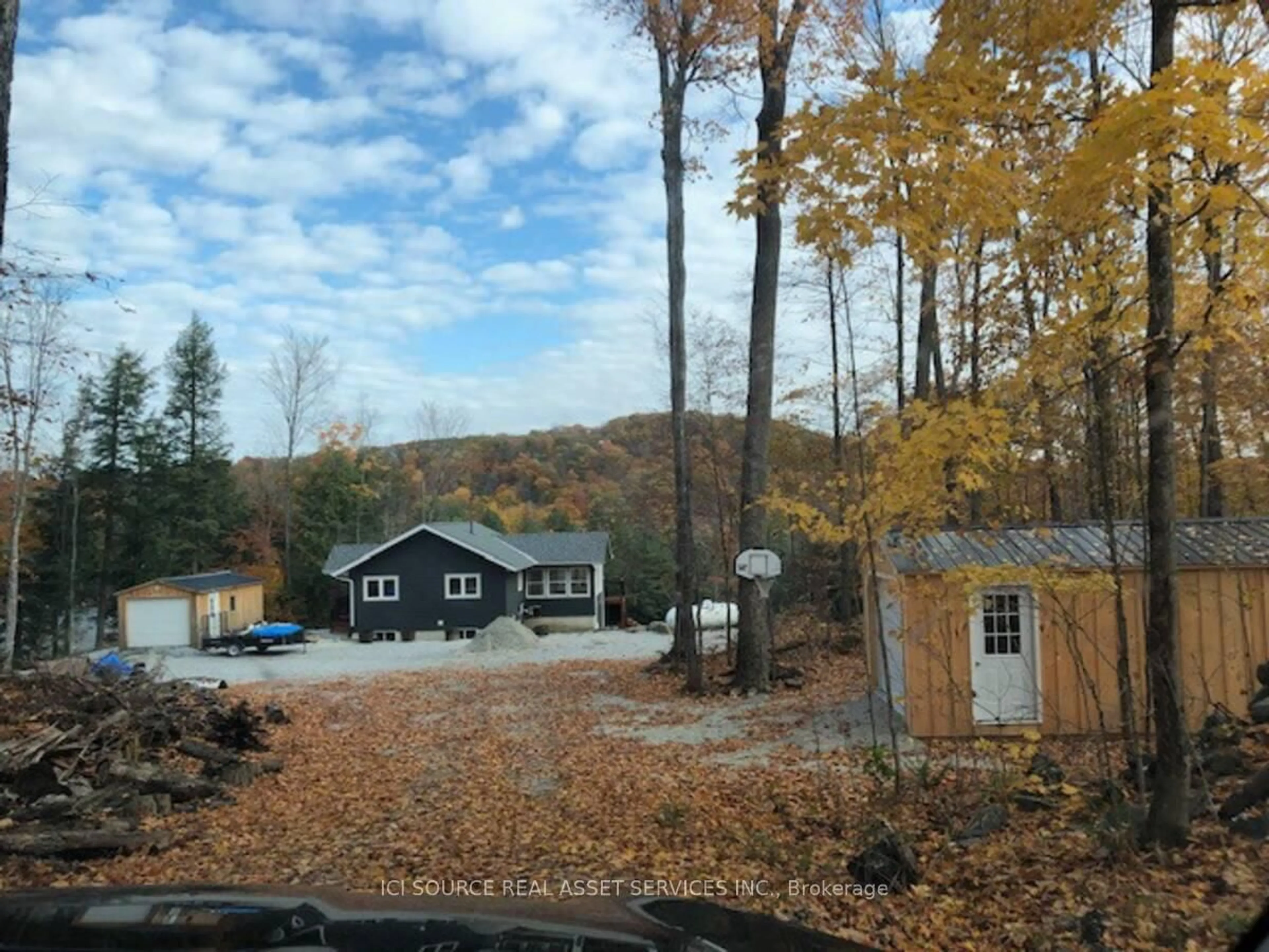 A pic from outside/outdoor area/front of a property/back of a property/a pic from drone, water/lake/river/ocean view for 1053C Granite Terrace Lane, Ompah Ontario K0H 2J0