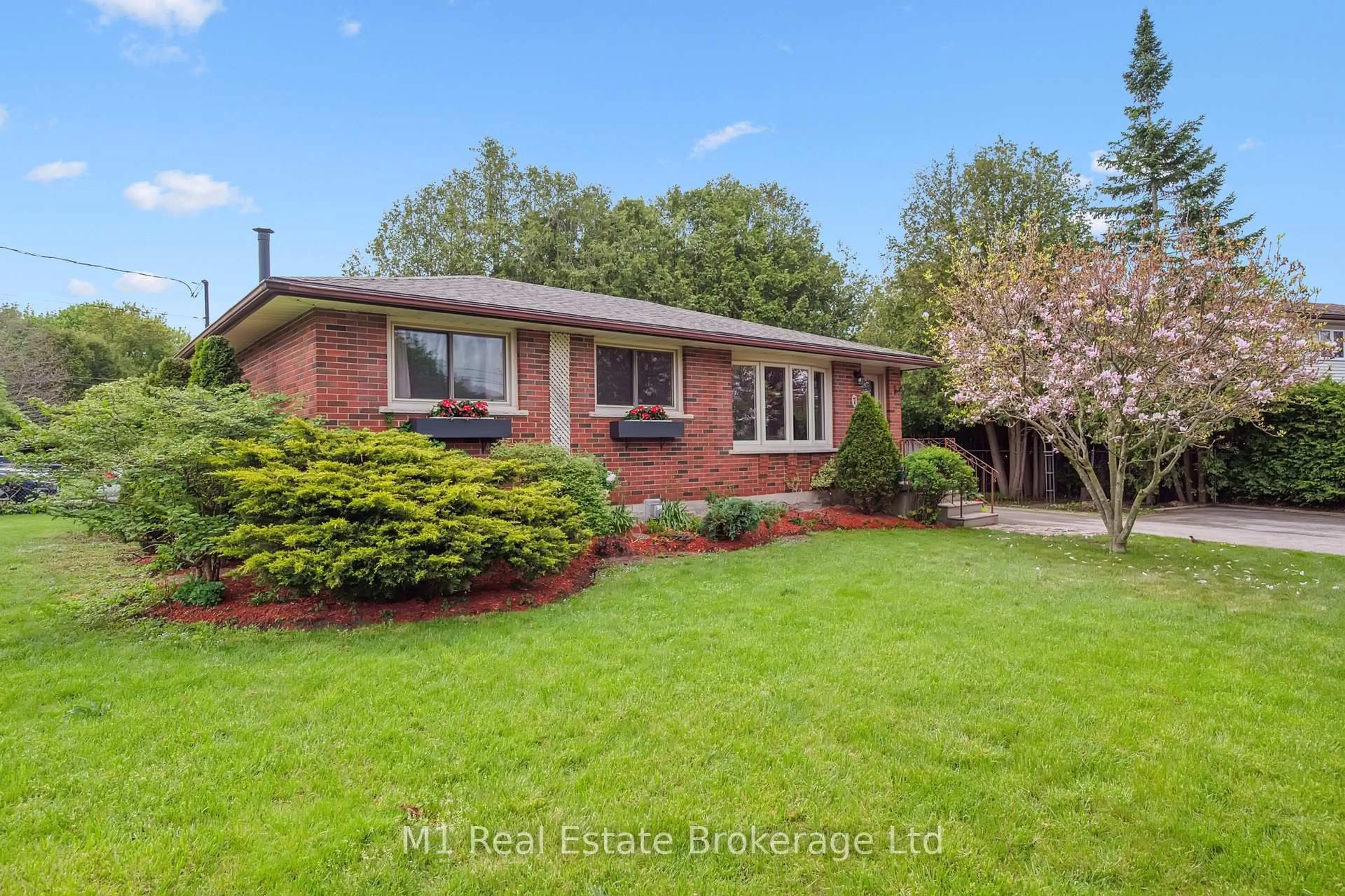 Home with brick exterior material, street for 7 Golfview Rd, Guelph Ontario N1E 1A3