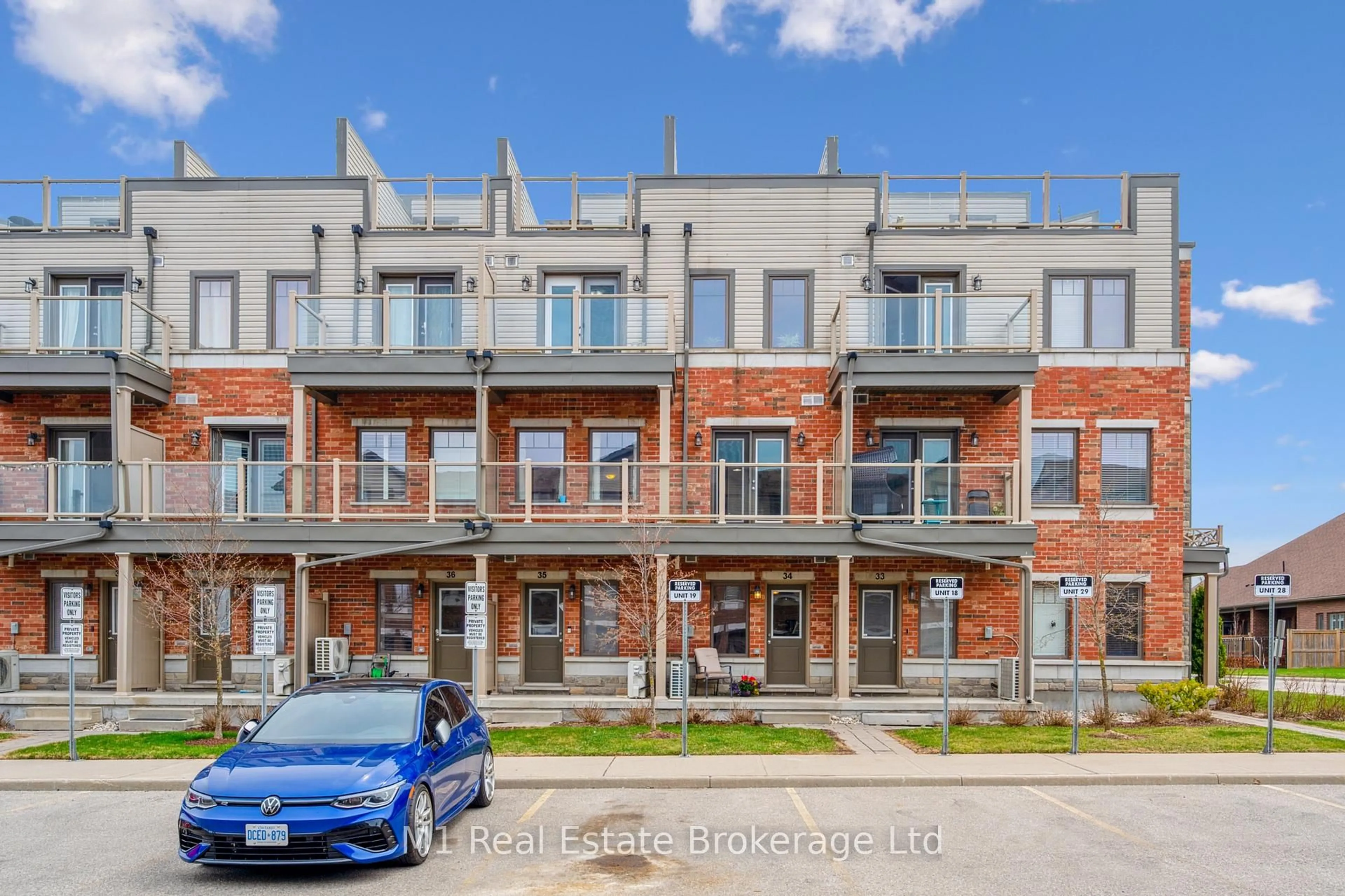 A pic from outside/outdoor area/front of a property/back of a property/a pic from drone, street for 39 Kay Cres #34, Guelph Ontario N1L 0N5