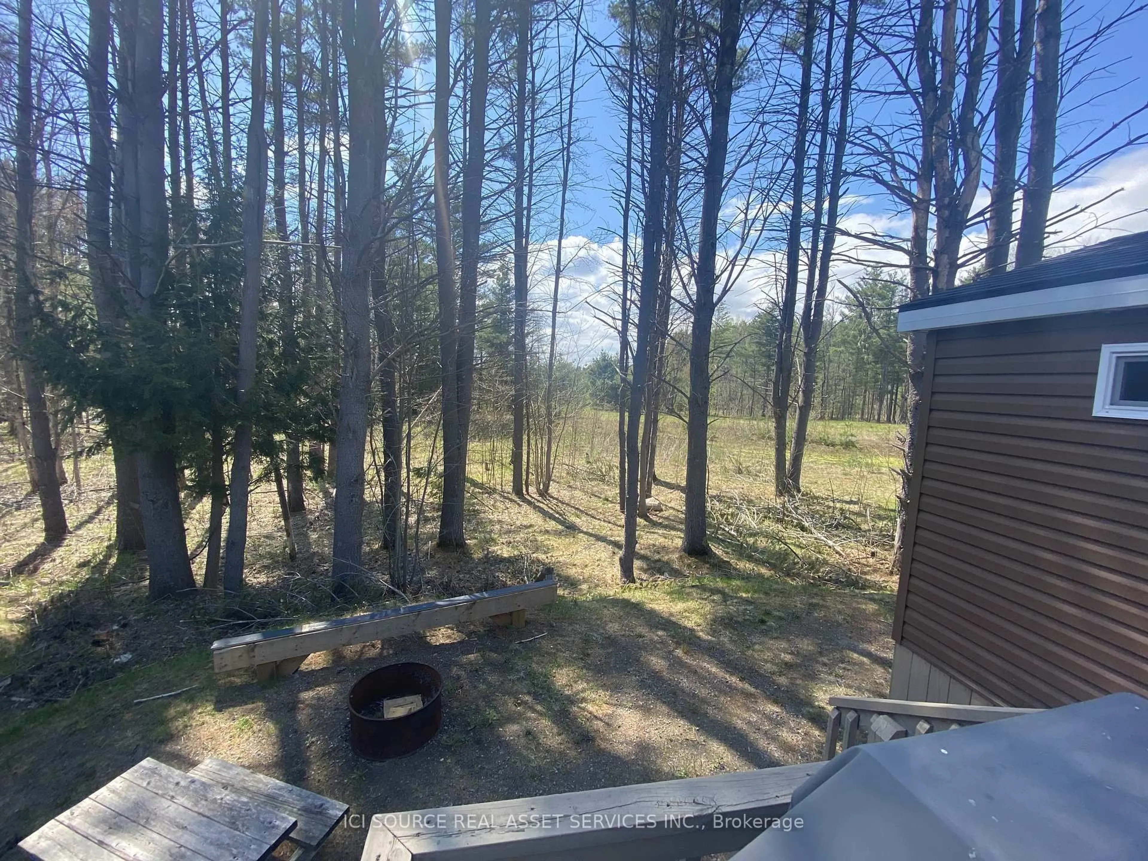 A pic from outside/outdoor area/front of a property/back of a property/a pic from drone, forest/trees view for 1082 Shamrock Marina Rd #252, Gravenhurst Ontario P0E 1N0