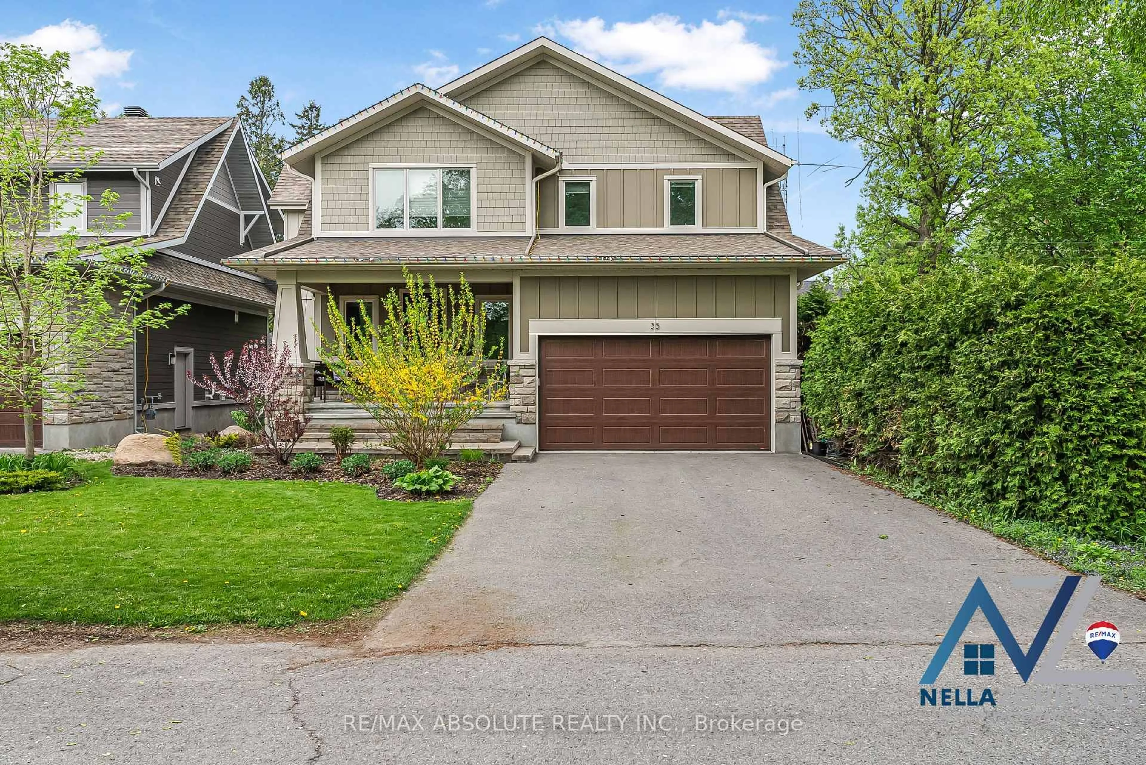 Home with vinyl exterior material, street for 35 St. Claire Ave, Ottawa Ontario K2G 2A1