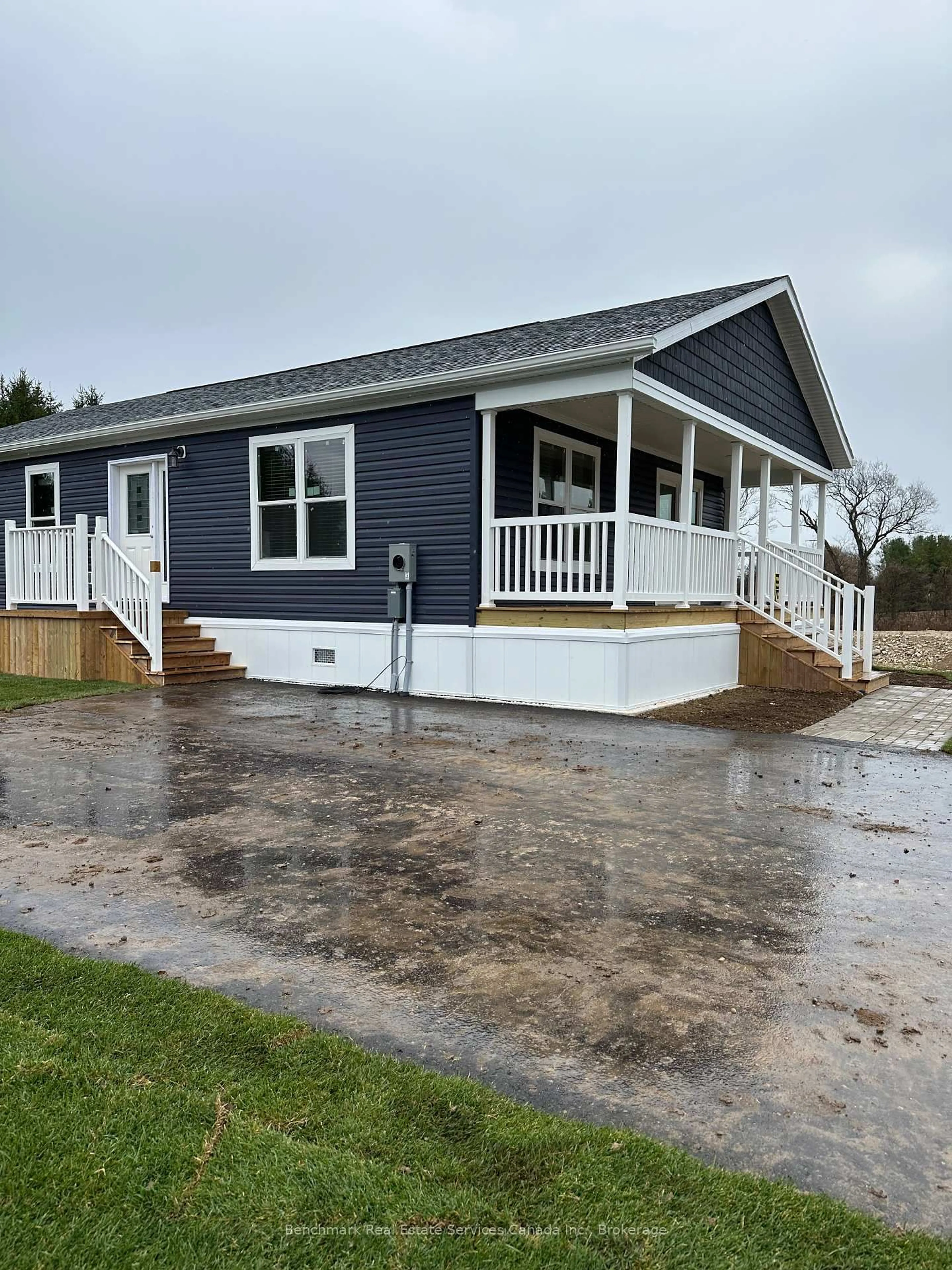 Home with vinyl exterior material, street for 210 Spruce Dr, West Grey Ontario N4N 3B8