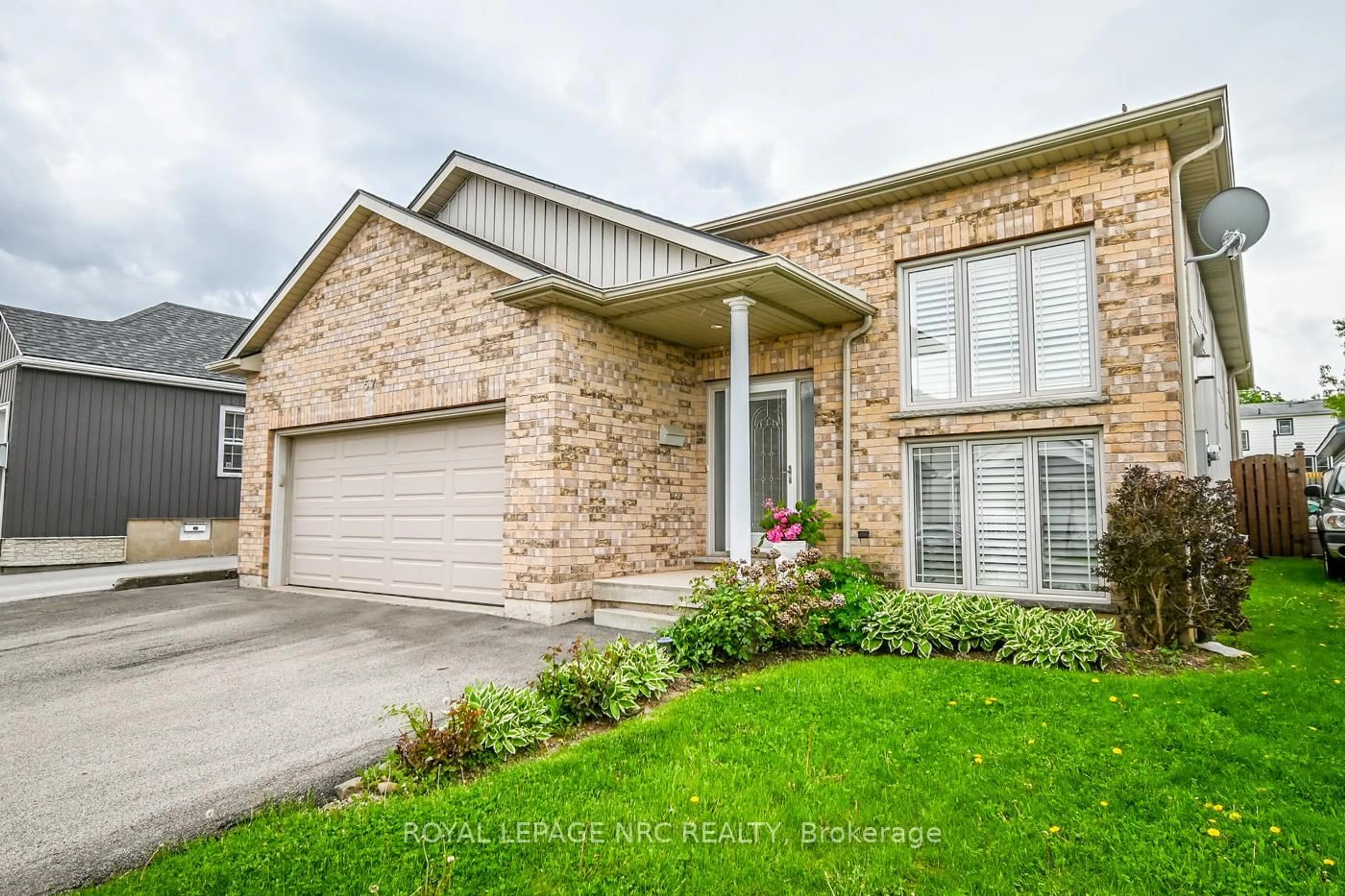 Home with brick exterior material, street for 57 Sullivan Ave, Thorold Ontario L2V 2Y7