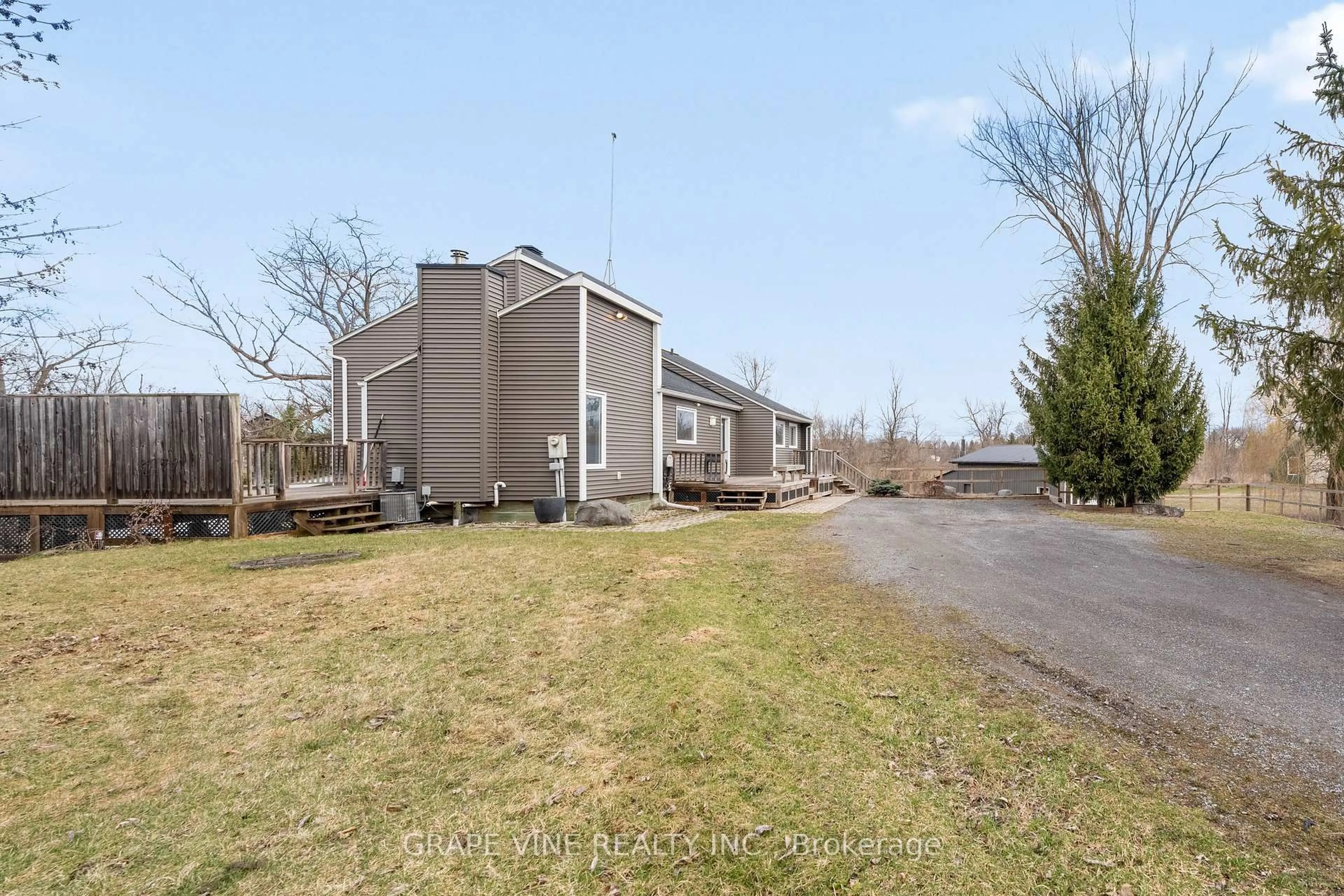 A pic from outside/outdoor area/front of a property/back of a property/a pic from drone, street for 1507 Century Rd, Kars Ontario K0A 2E0