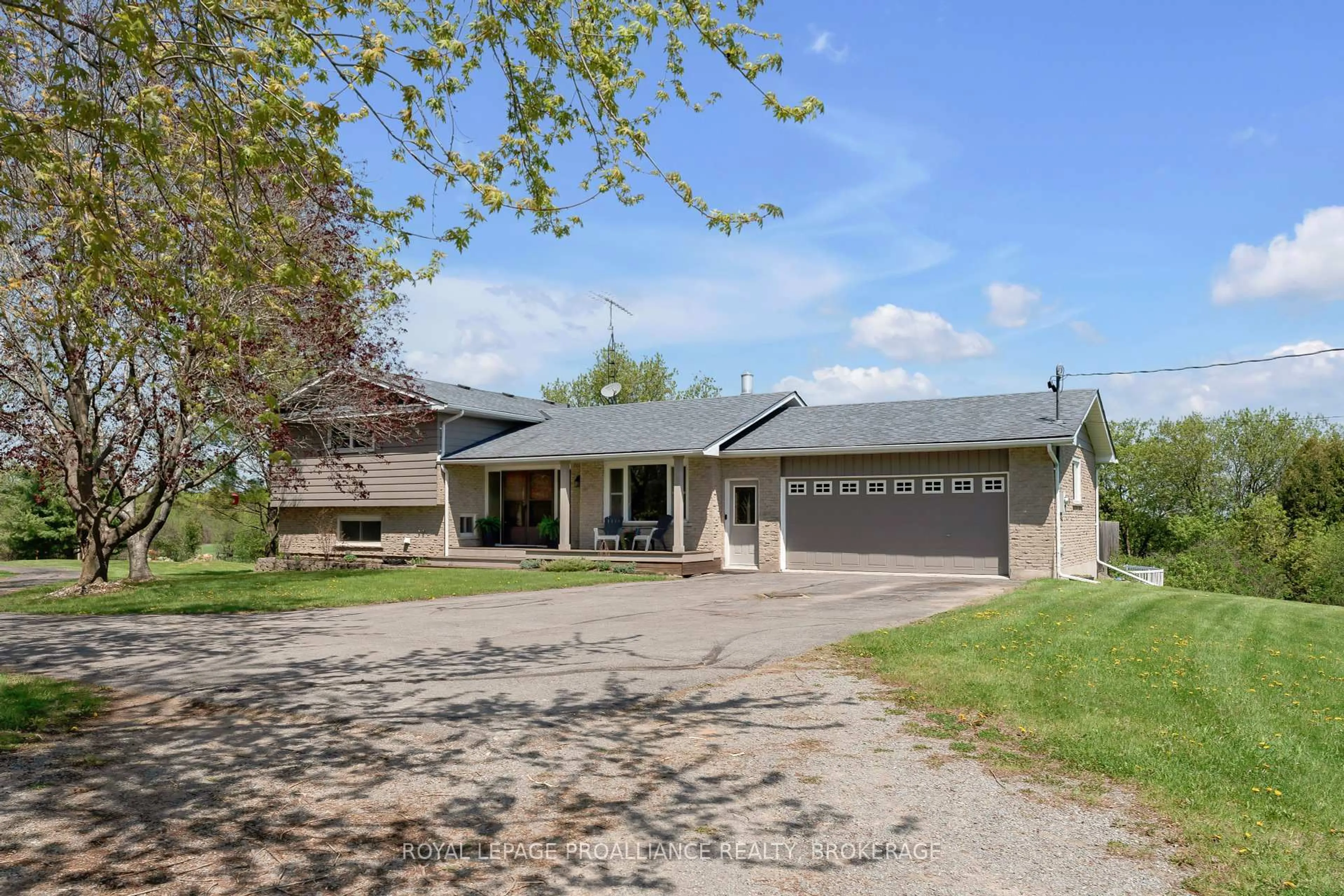A pic from outside/outdoor area/front of a property/back of a property/a pic from drone, street for 1960 Keeley Rd, Sydenham Ontario K0H 2T0