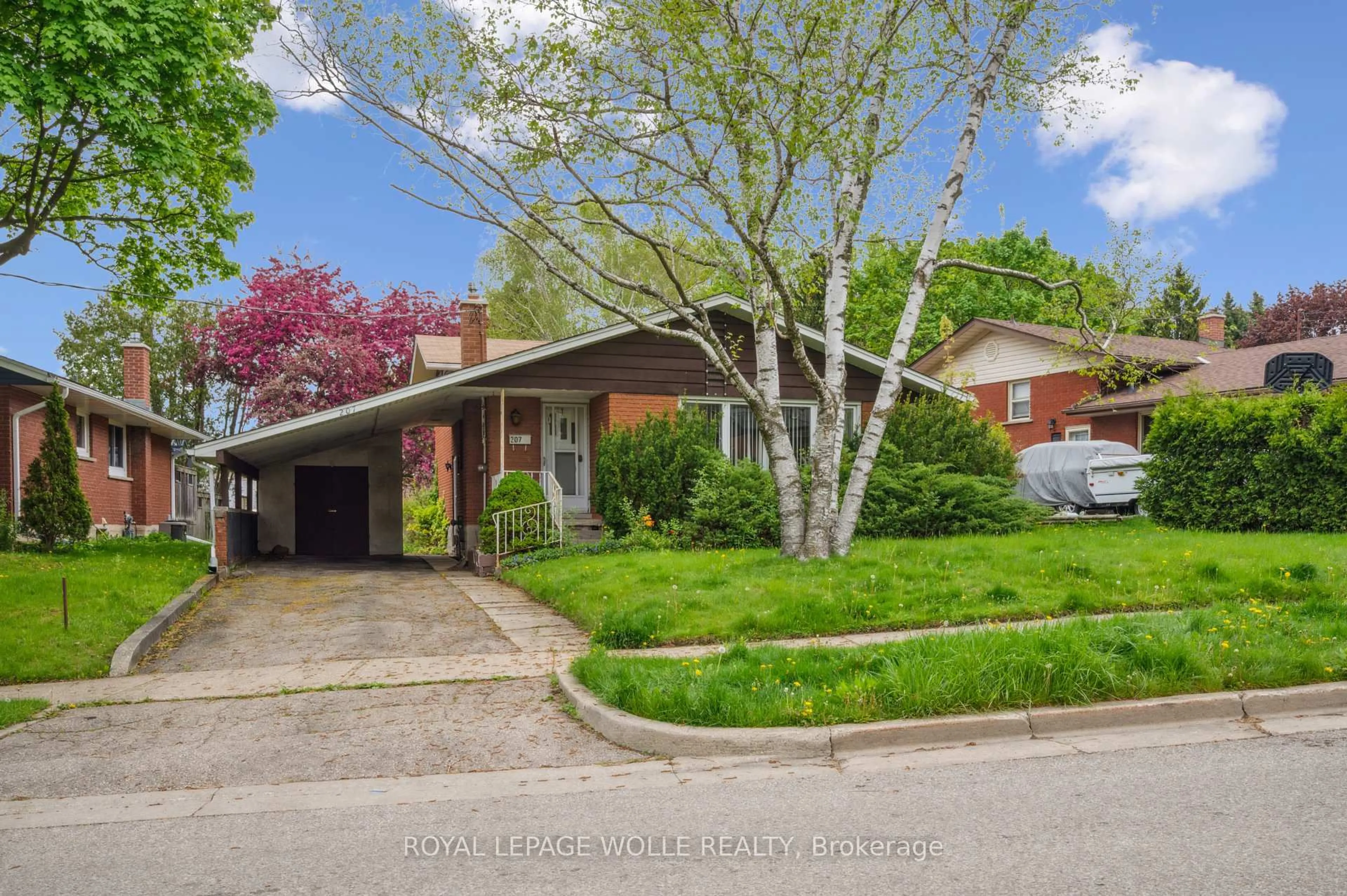 Home with brick exterior material, street for 207 Sweetbriar Dr, Kitchener Ontario N2M 4S9