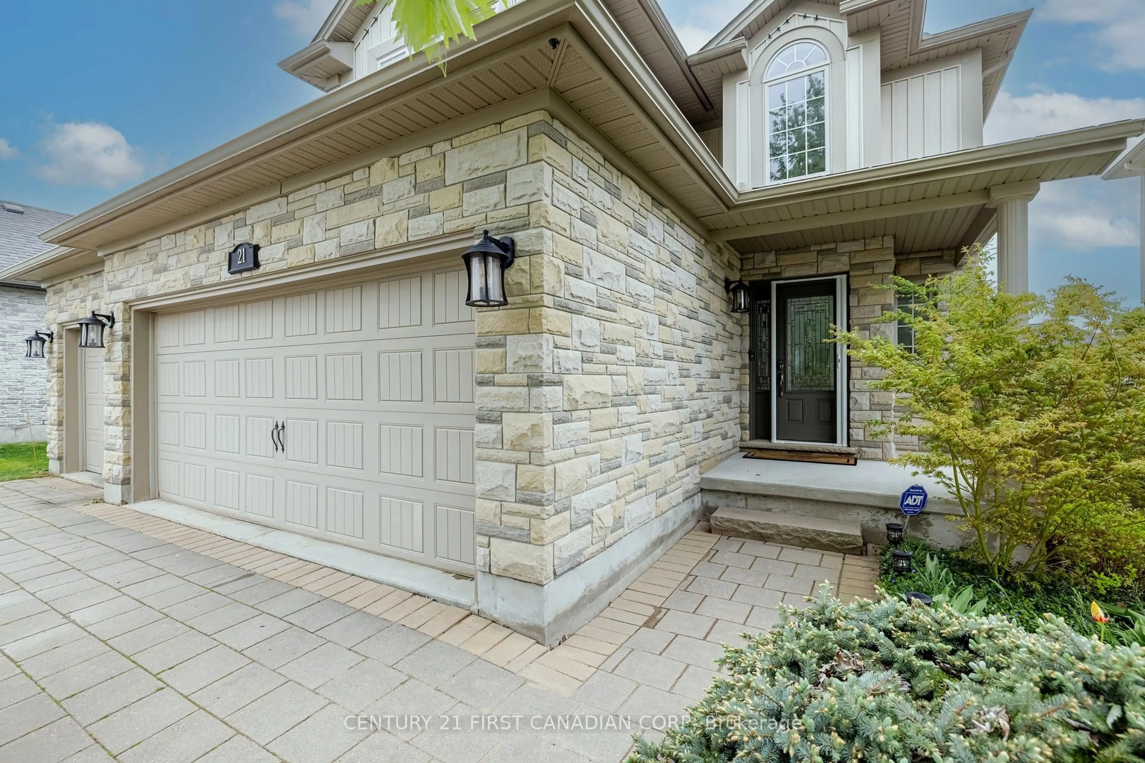 Home with brick exterior material, street for 21 Maplewood Lane, Middlesex Centre Ontario M0M 2A0