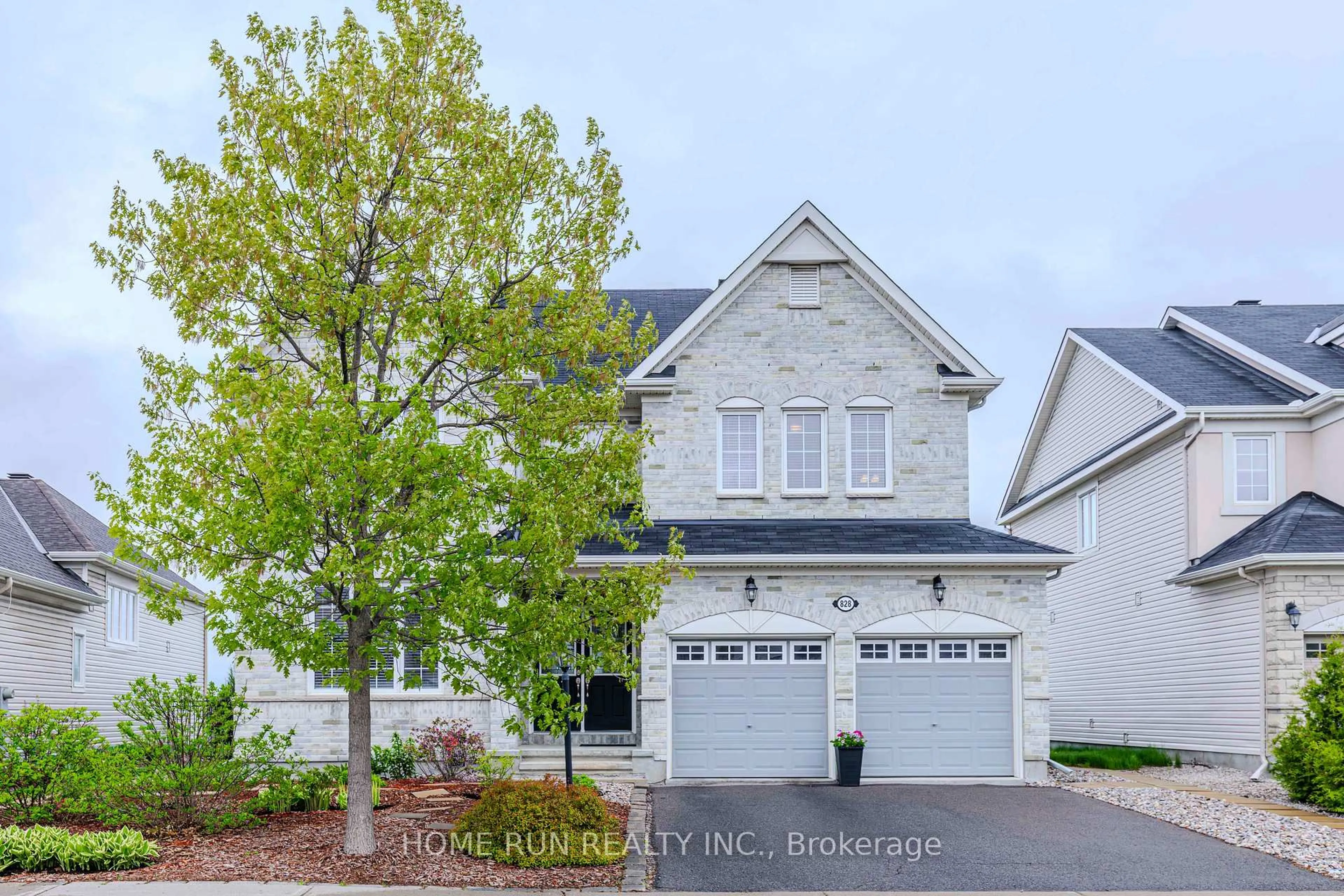 Home with brick exterior material, street for 828 Kilbirnie Dr, Ottawa Ontario K2J 5T9