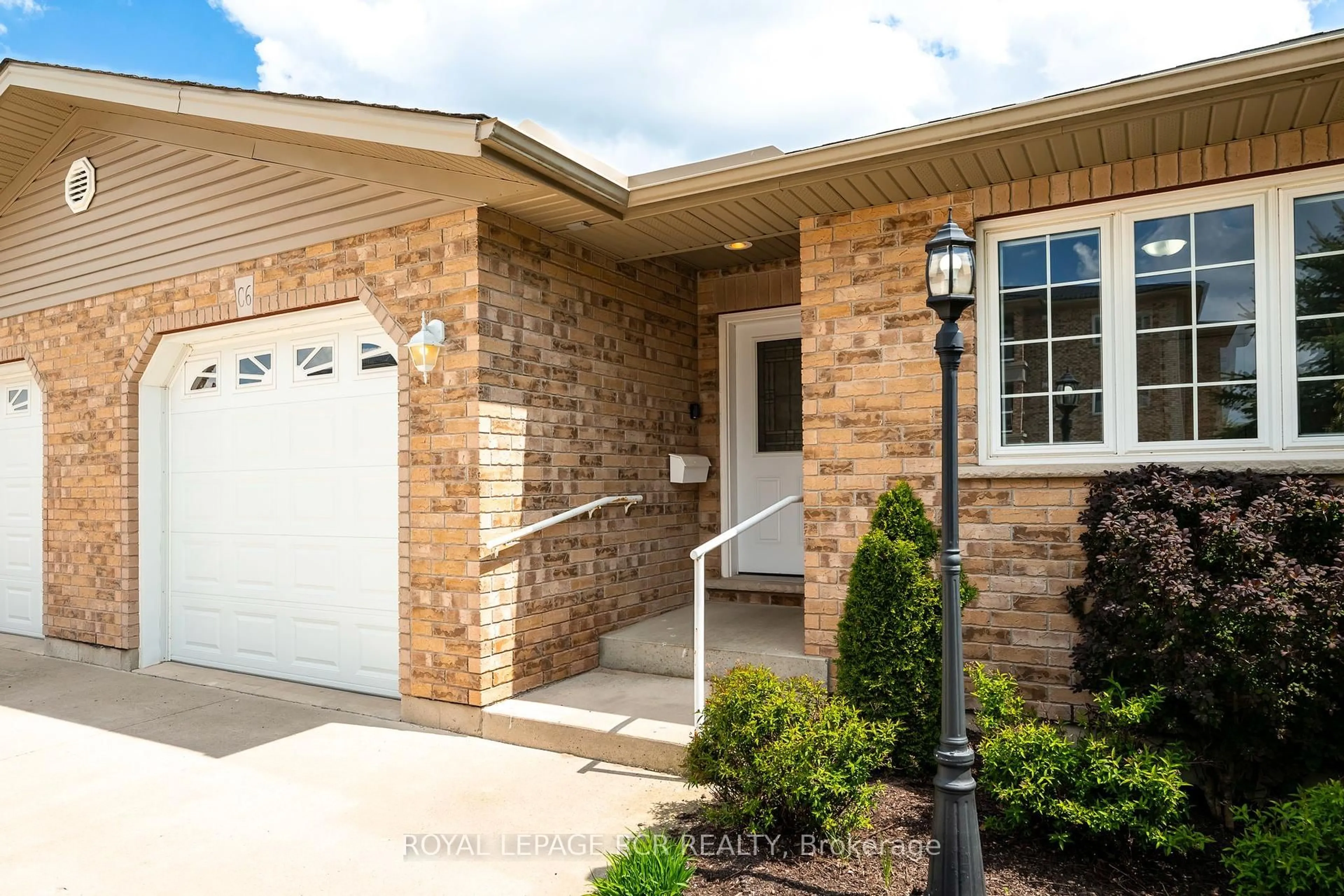 Home with brick exterior material, street for 401 Birmingham St #C6, Wellington North Ontario N0G 2L2
