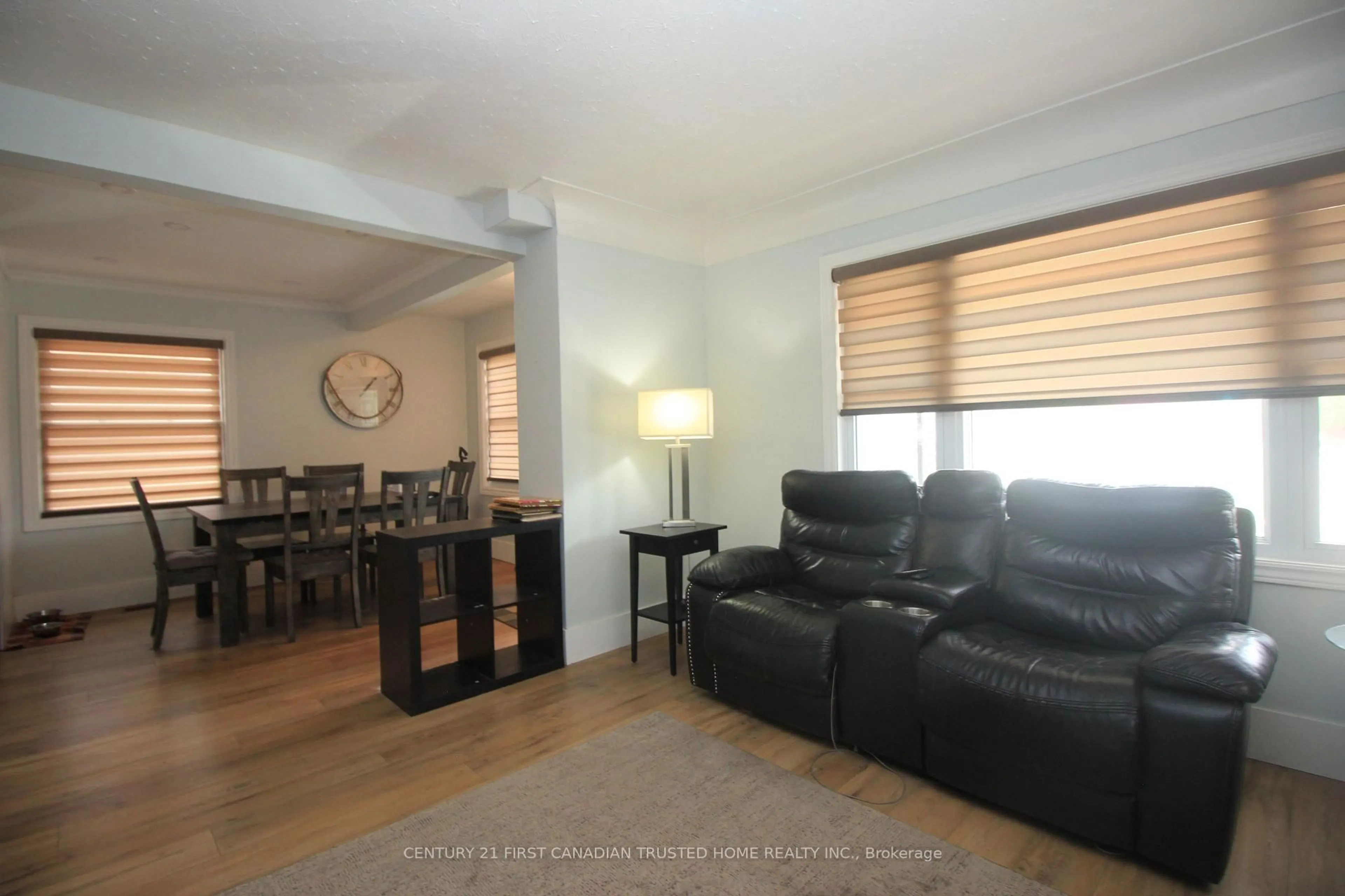 Living room with furniture, wood/laminate floor for 73 Jaqueline St, London South Ontario N5Z 3P8