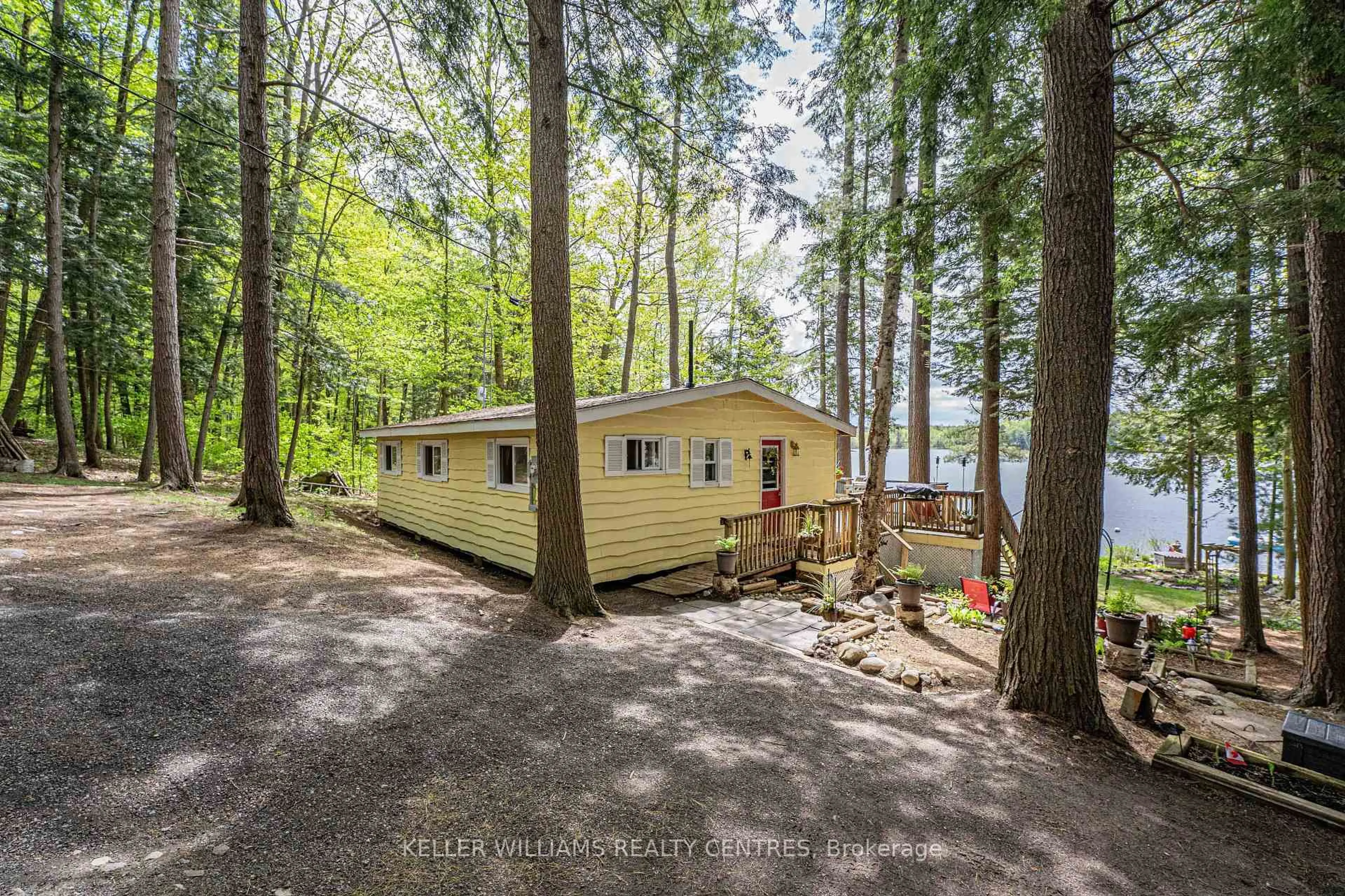A pic from outside/outdoor area/front of a property/back of a property/a pic from drone, water/lake/river/ocean view for 1019 Carl's Rd #5, Muskoka Lakes Ontario P0B 1J0