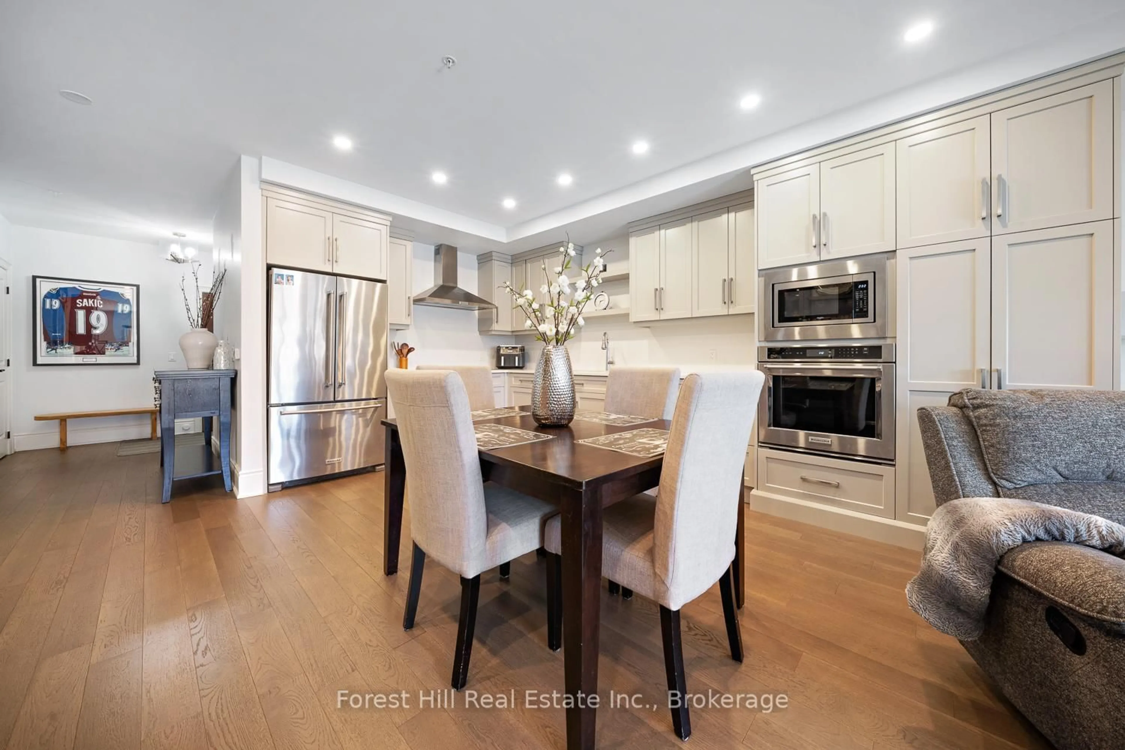 Open concept kitchen, wood/laminate floor for 11B Salt Dock Rd #204, Parry Sound Ontario P2A 3B6