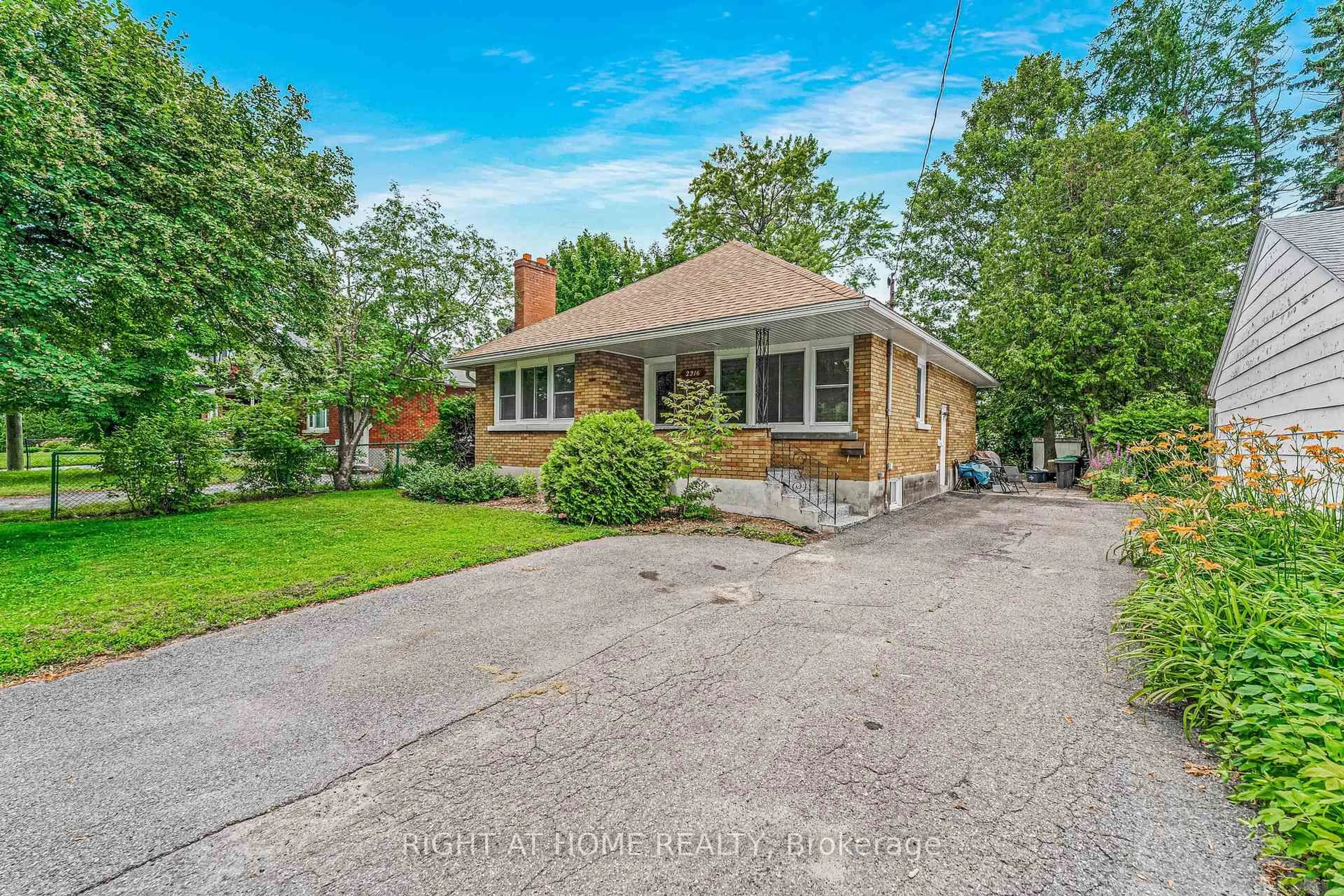 Home with brick exterior material, street for 2216 Prospect Ave, Ottawa Ontario K1H 7G3