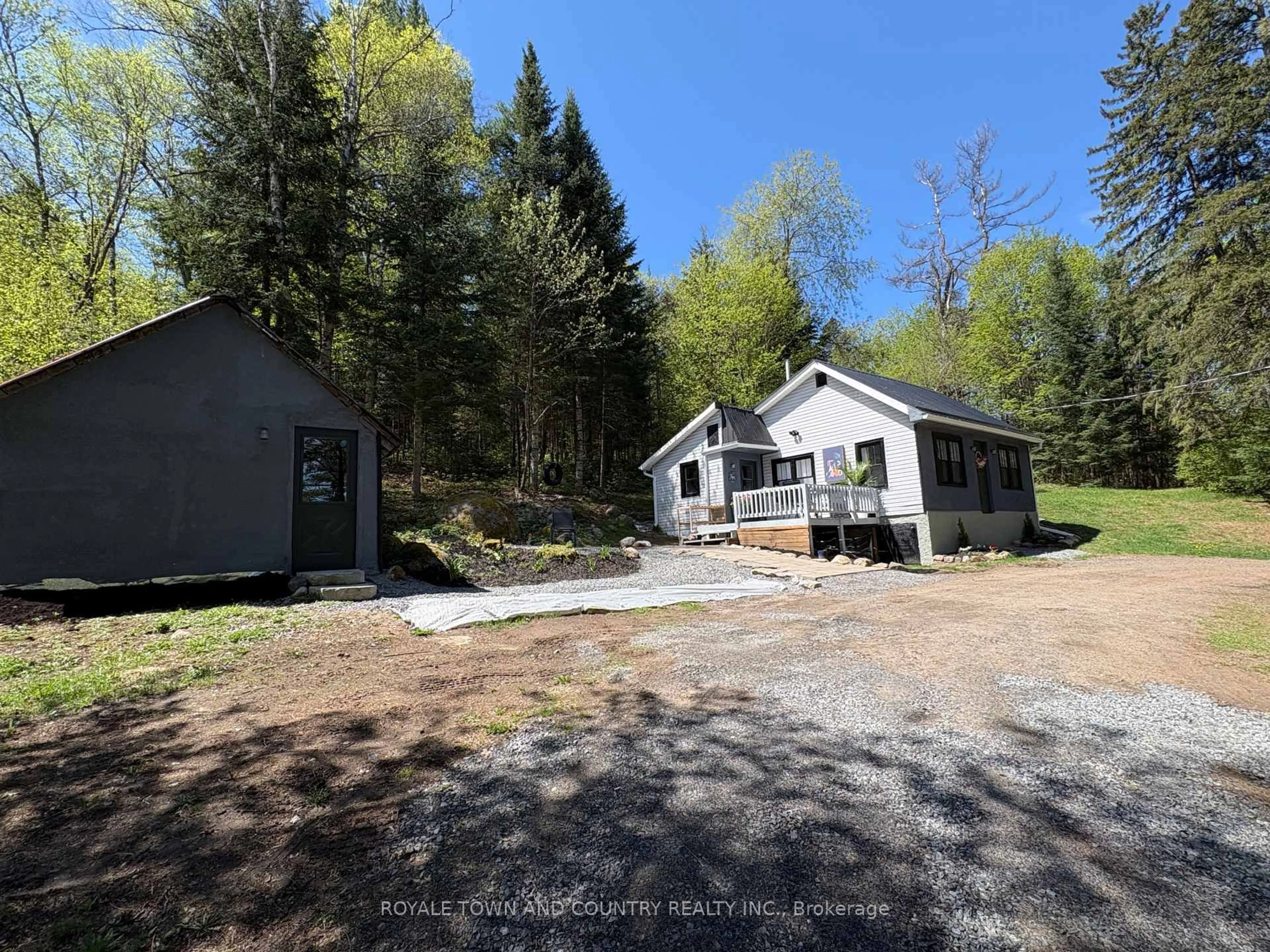 A pic from outside/outdoor area/front of a property/back of a property/a pic from drone, unknown for 2094 592 Highway, Perry Ontario P0A 1J0