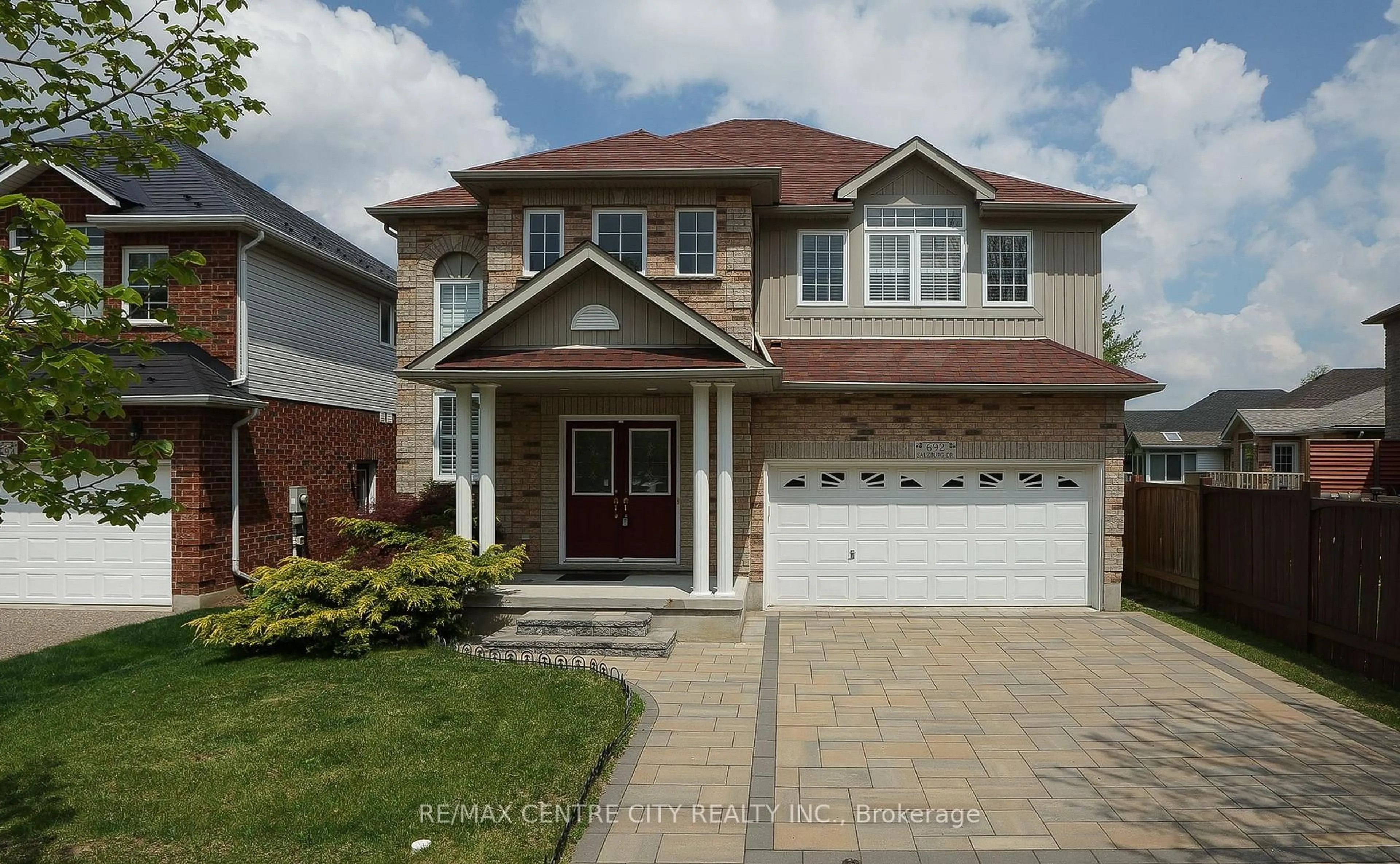 Home with brick exterior material, street for 692 Salzburg Dr, Waterloo Ontario N2V 2N8