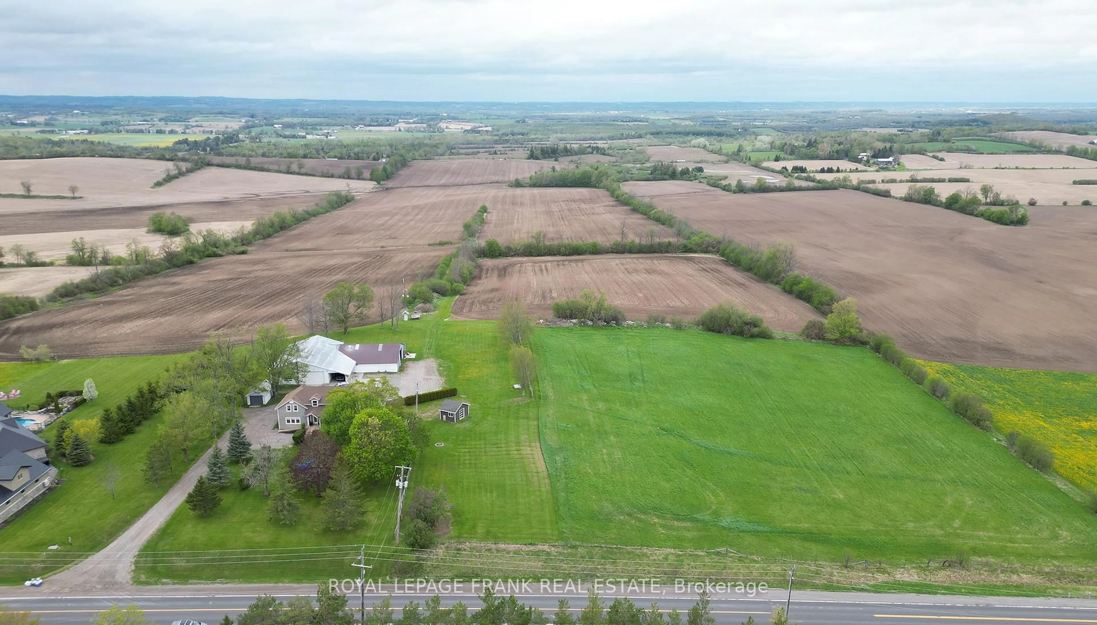A pic from outside/outdoor area/front of a property/back of a property/a pic from drone, unknown for 100 County 2 Rd, Otonabee-South Monaghan Ontario K0L 1B0