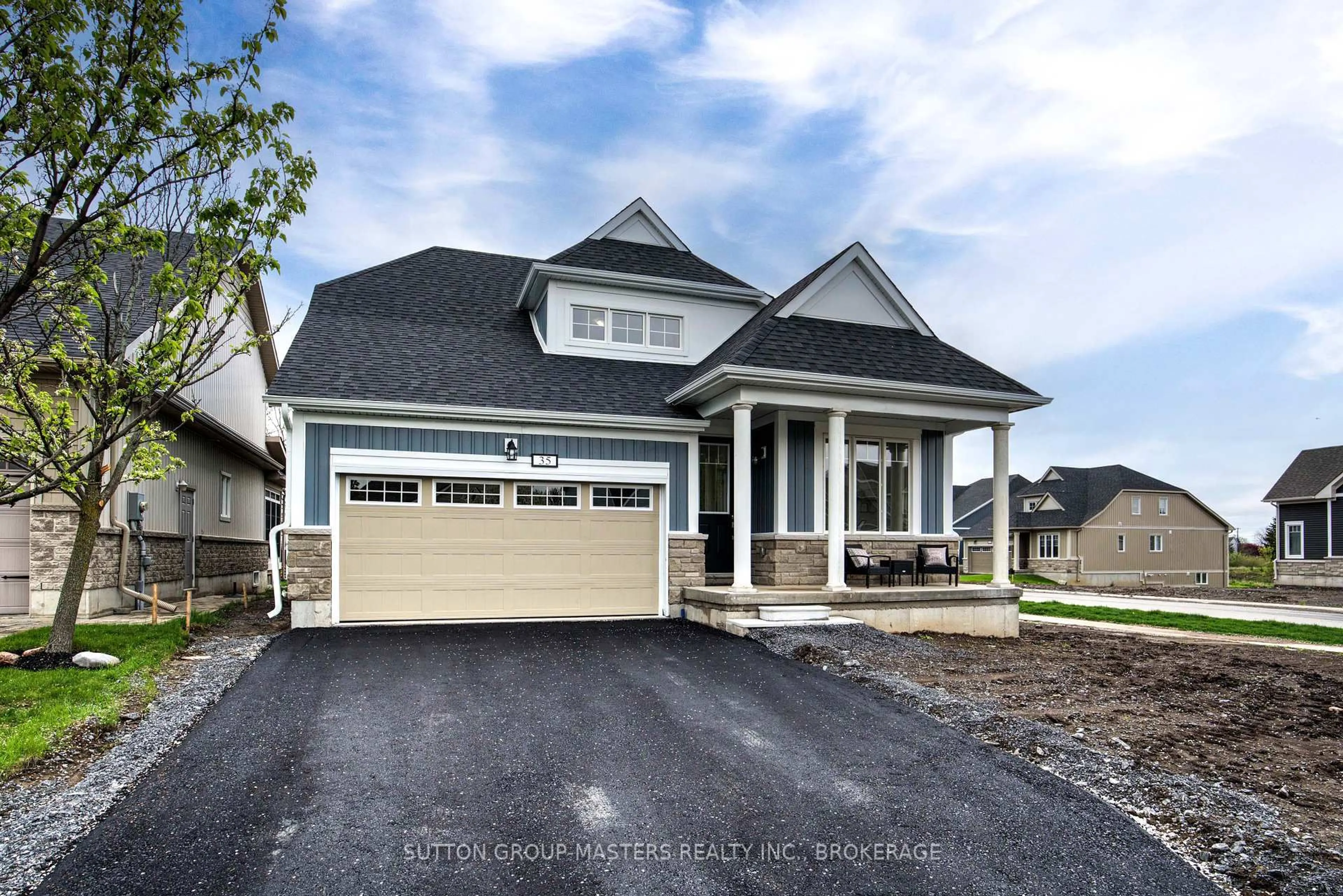 Home with vinyl exterior material, street for 35 Country Club Dr, Bath Ontario K0H 1G0