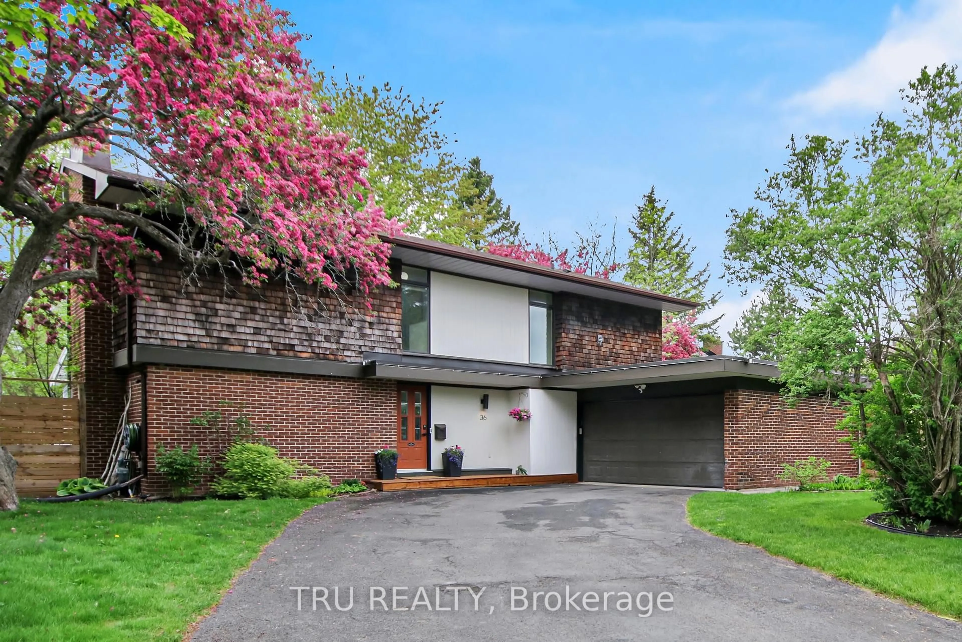 Home with brick exterior material, street for 36 Varley Dr, Kanata Ontario K2K 1G2