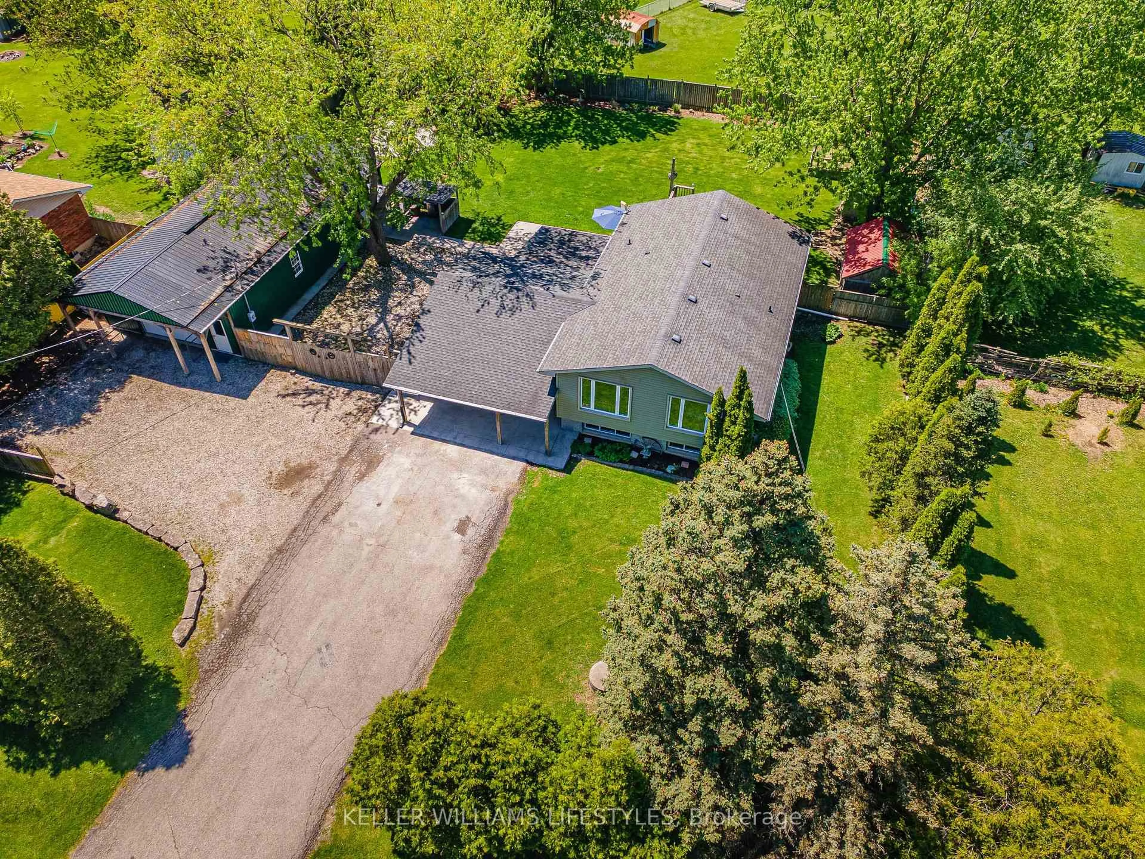 A pic from outside/outdoor area/front of a property/back of a property/a pic from drone, street for 3 East Williams St, North Middlesex Ontario N0M 1A0