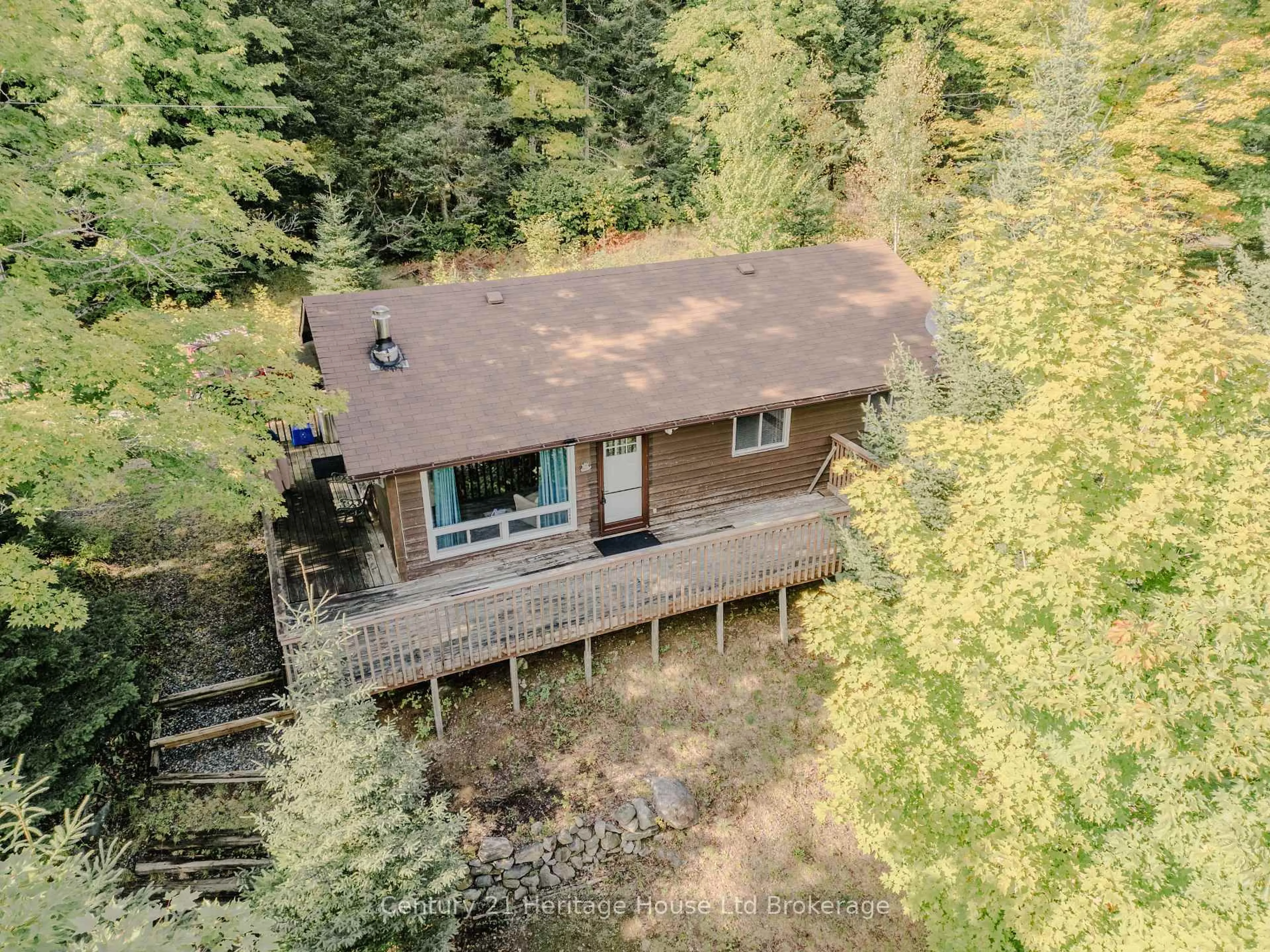 A pic from outside/outdoor area/front of a property/back of a property/a pic from drone, forest/trees view for 95 GRAY JAY LANE N/A, Kearney Ontario P0A 1M0