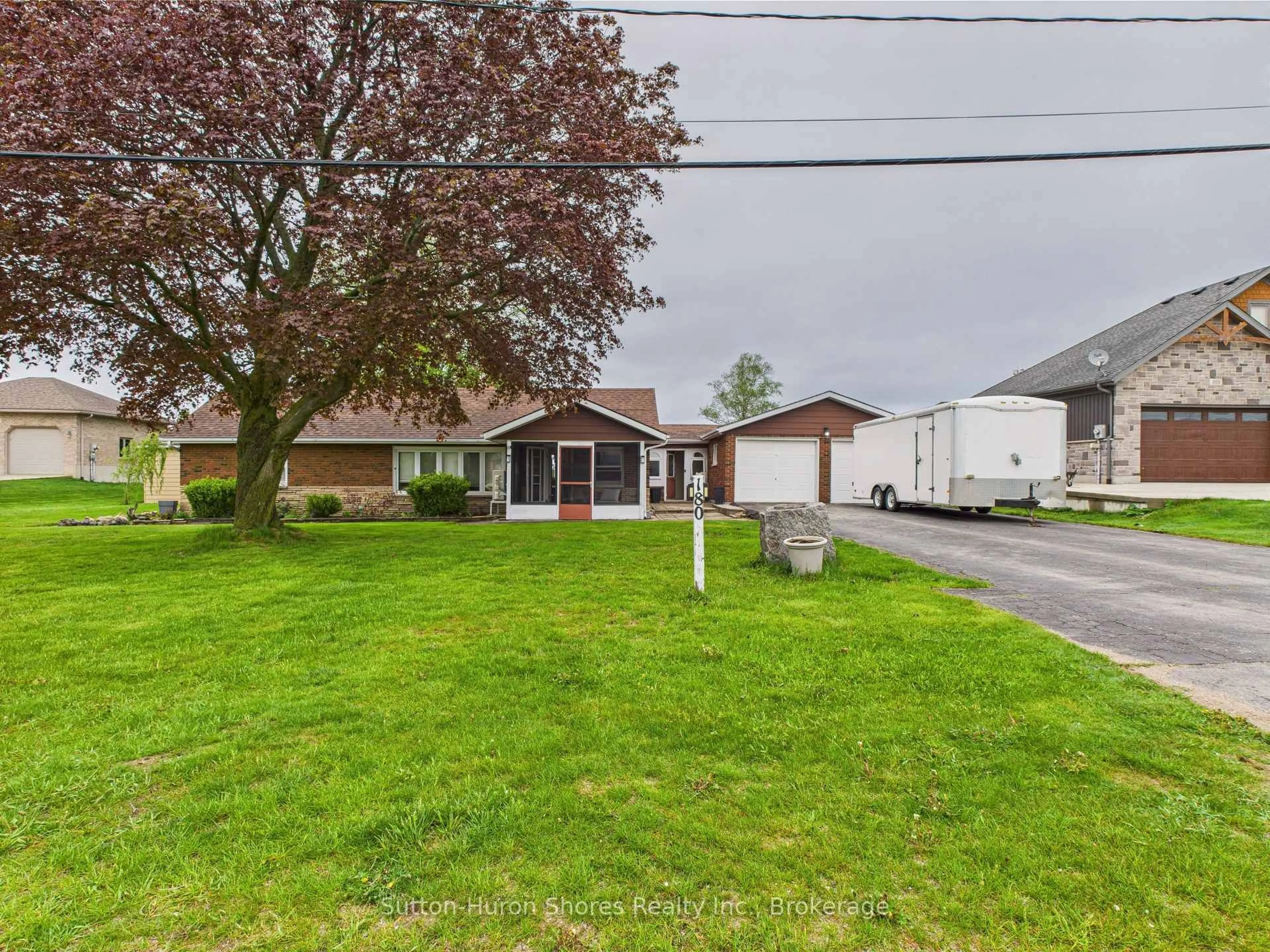 A pic from outside/outdoor area/front of a property/back of a property/a pic from drone, street for 180 South Rankin St, Saugeen Shores Ontario N0H 2L0