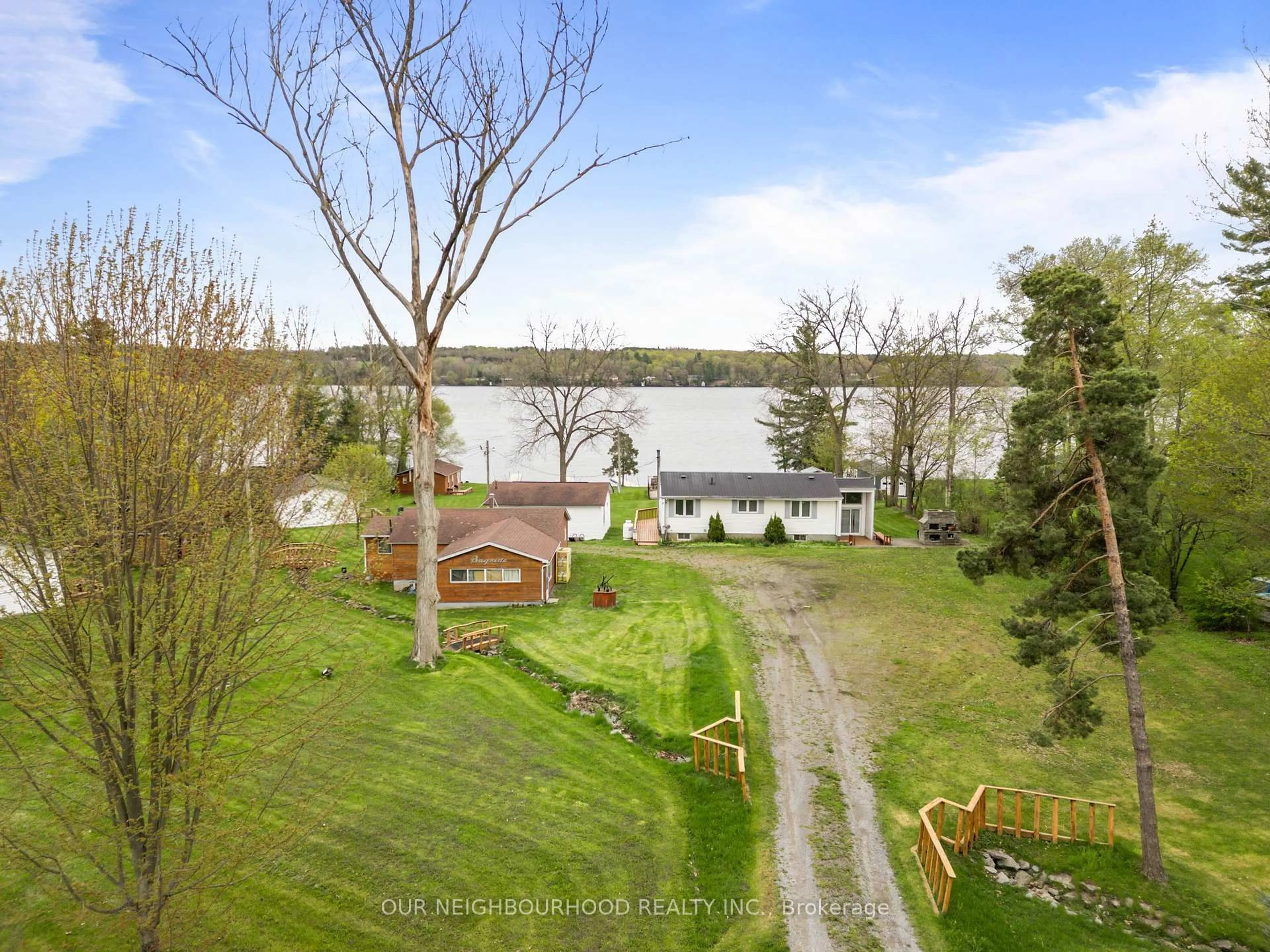 A pic from outside/outdoor area/front of a property/back of a property/a pic from drone, water/lake/river/ocean view for 10 Richardson Rd, Prince Edward County Ontario K0K 2T0