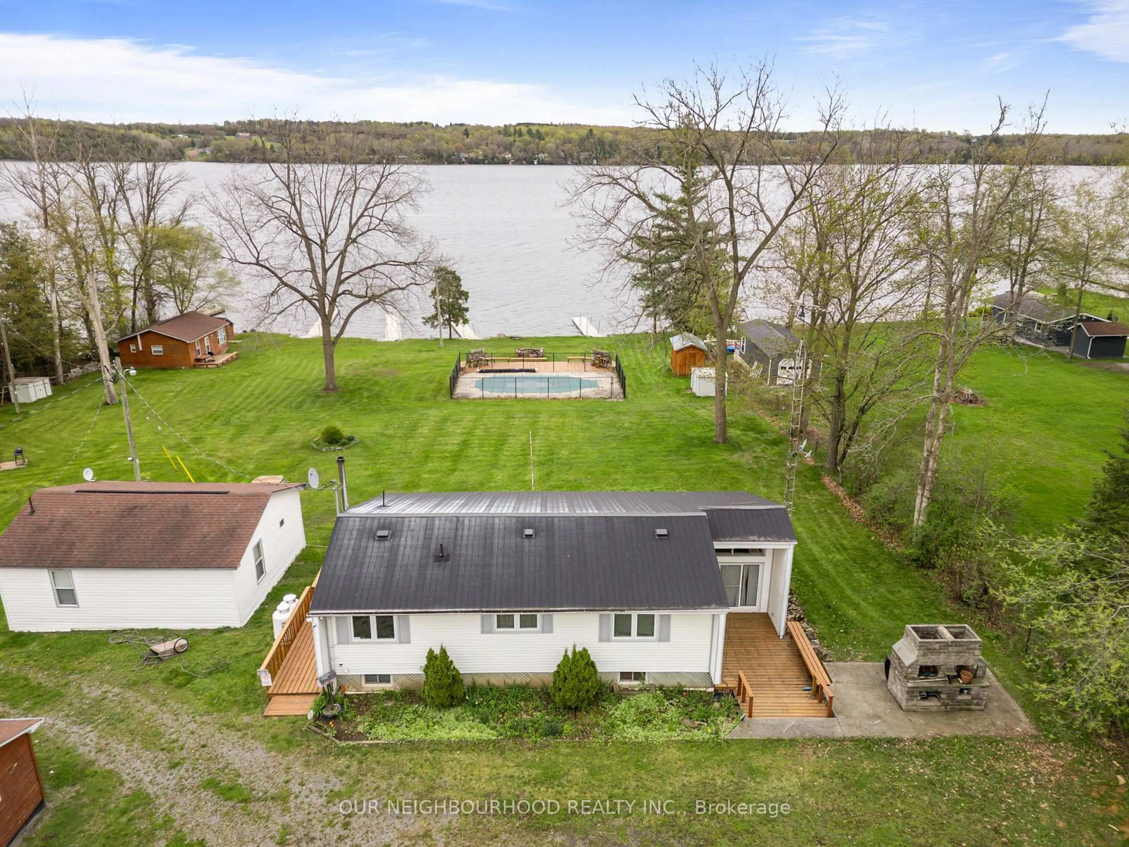 A pic from outside/outdoor area/front of a property/back of a property/a pic from drone, water/lake/river/ocean view for 10 Richardson Rd, Prince Edward County Ontario K0K 2T0