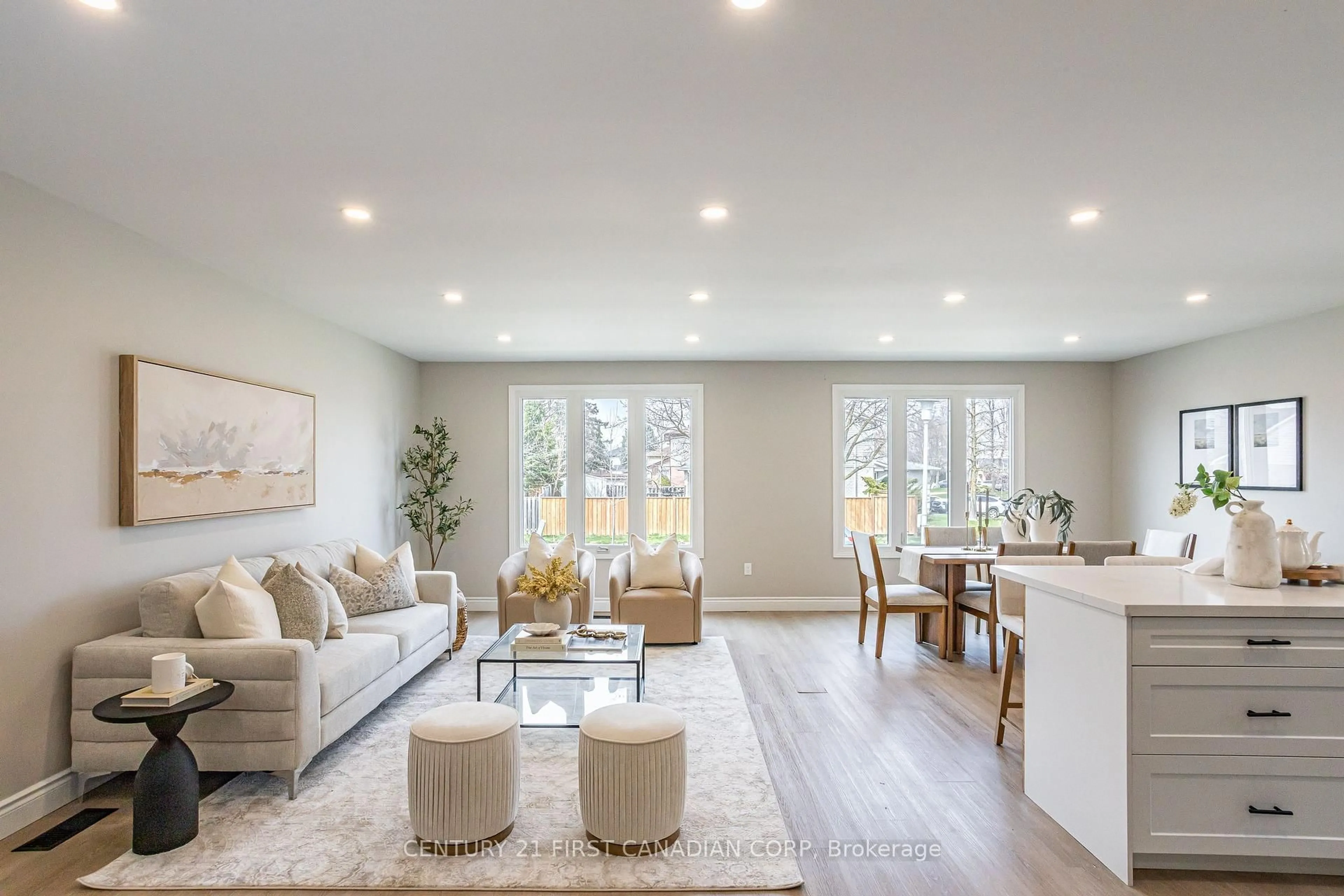 Living room with furniture, wood/laminate floor for 40 Bexhill Dr, London South Ontario N6E 1X2
