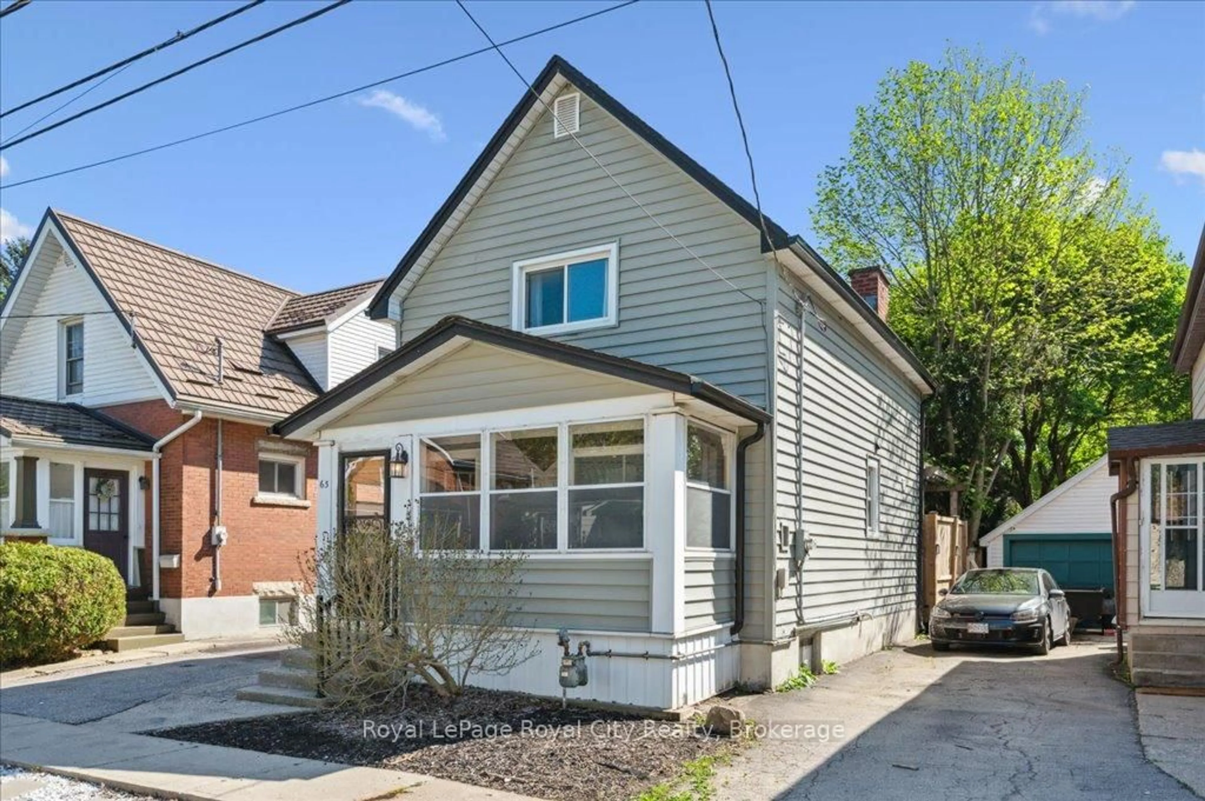 Home with brick exterior material, street for 63 Audrey Ave, Guelph Ontario N1E 5Y1