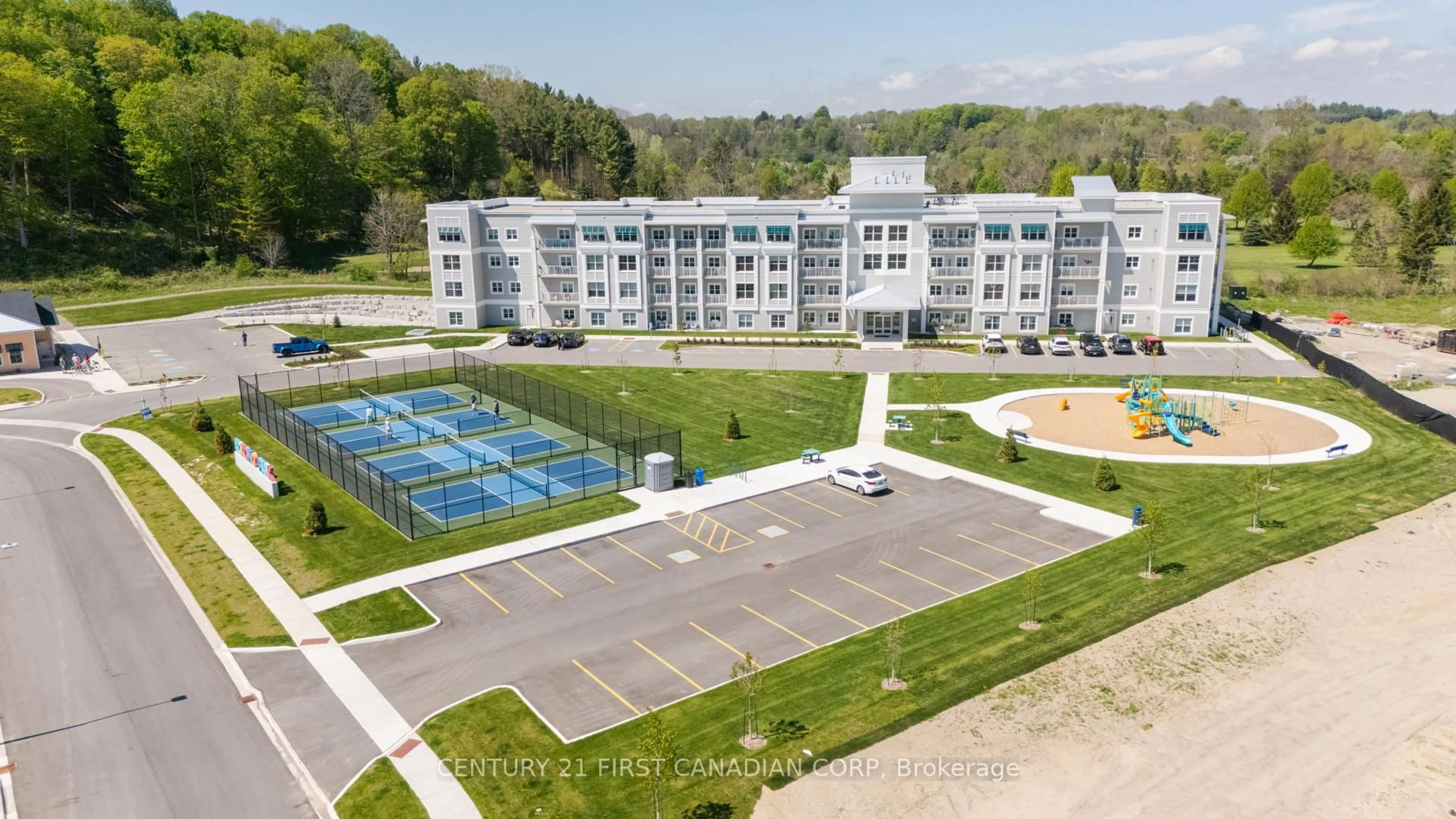 A pic from outside/outdoor area/front of a property/back of a property/a pic from drone, building for 100 The Prom #403, Central Elgin Ontario N5L 0B7